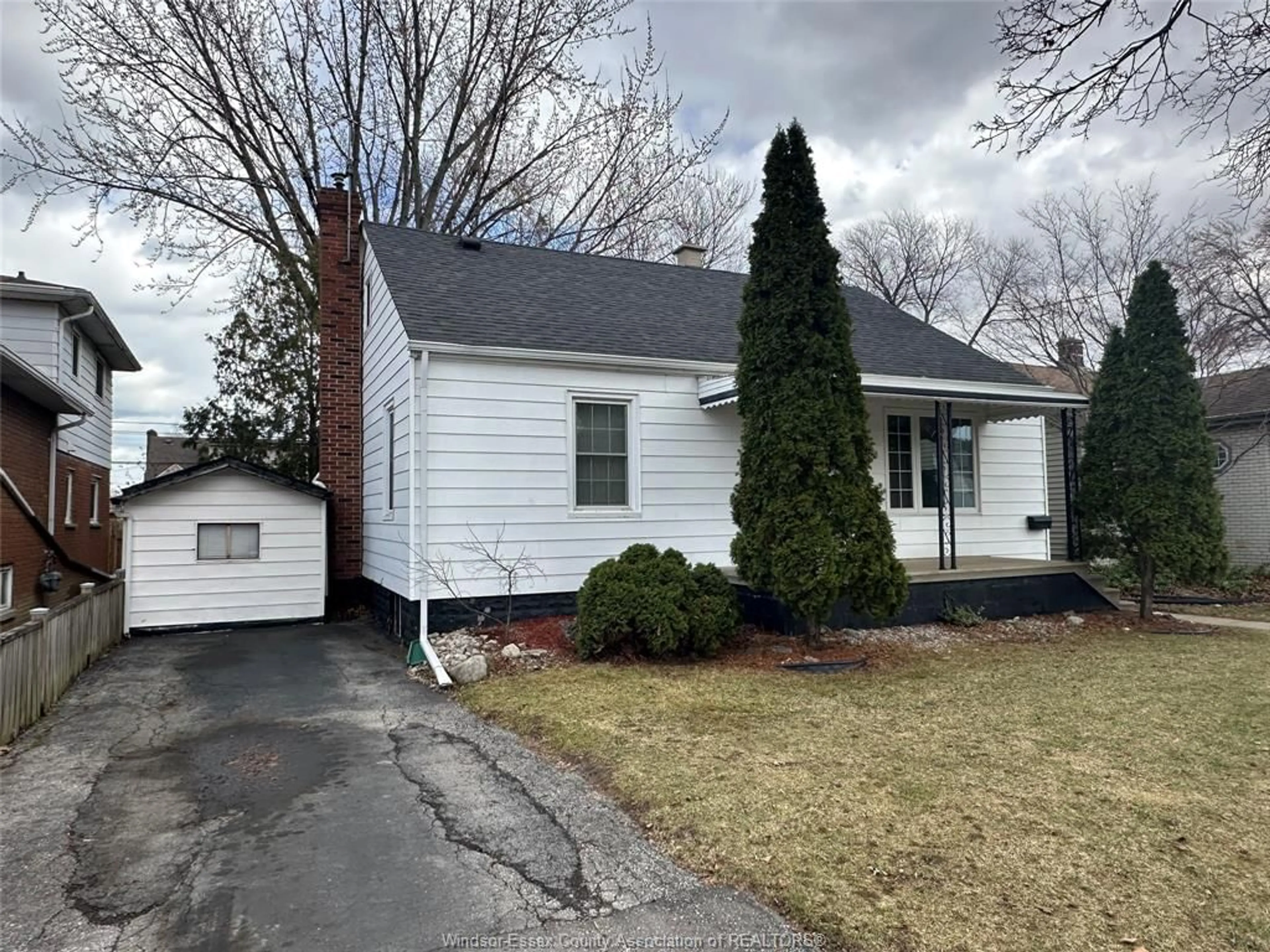 Home with vinyl exterior material, street for 1418 PILLETTE Rd, Windsor Ontario N8Y 3B9