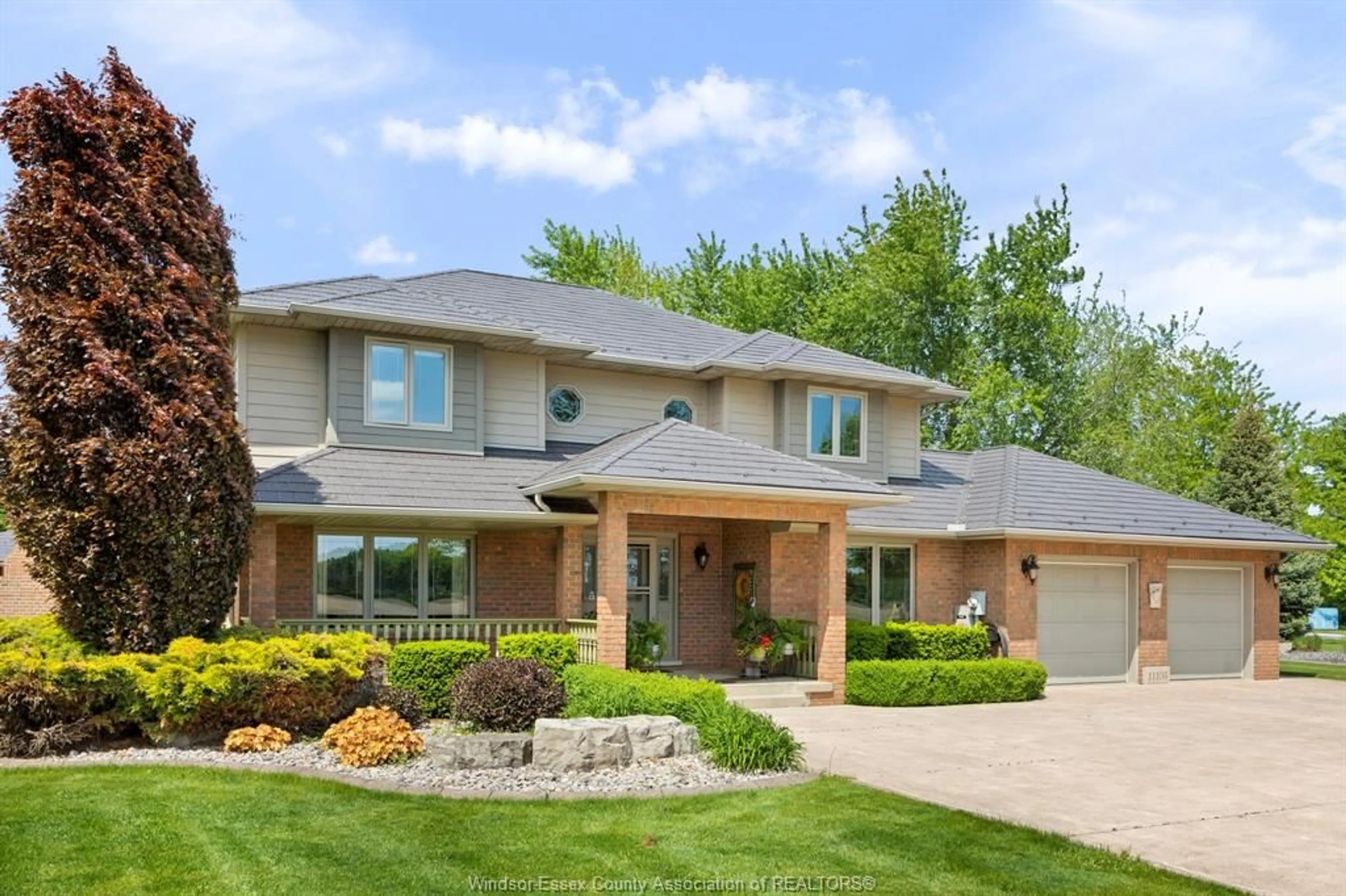 Home with brick exterior material, street for 11108 11TH CONCESSION Rd, Essex Ontario N0R 1J0