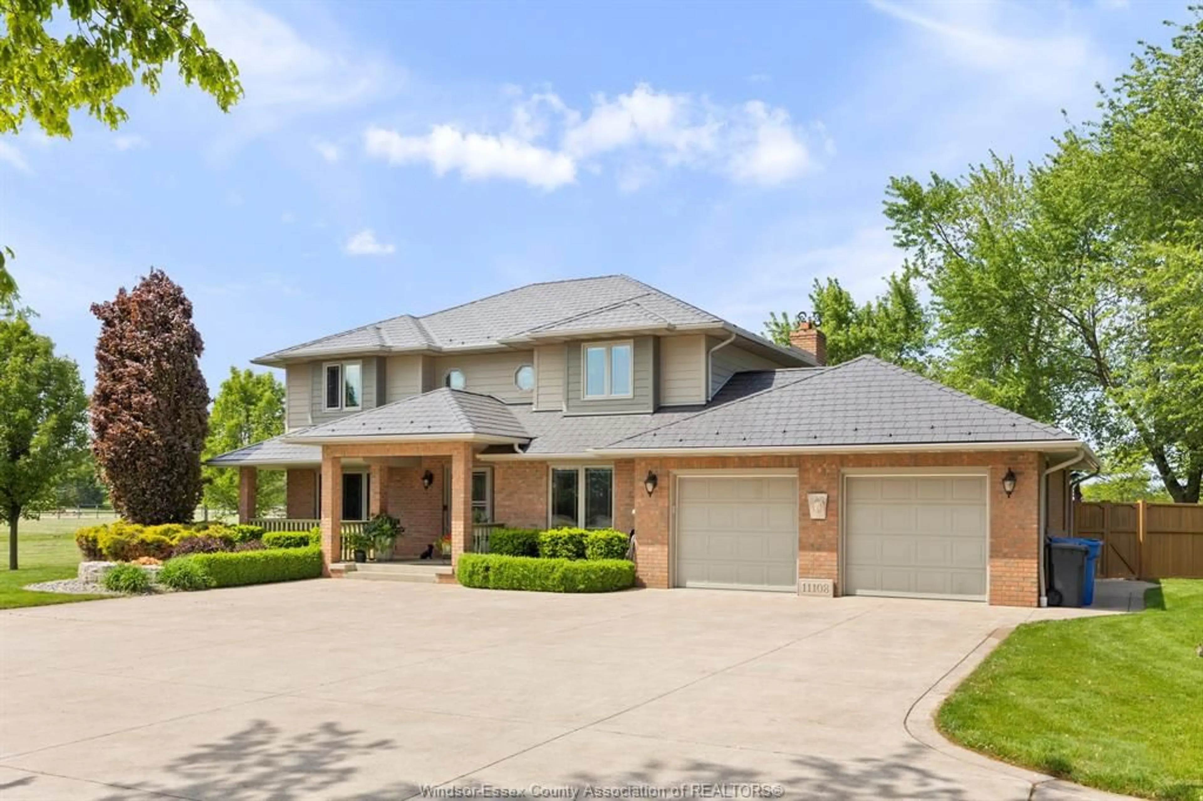 Home with brick exterior material, street for 11108 11TH CONCESSION Rd, Essex Ontario N0R 1J0