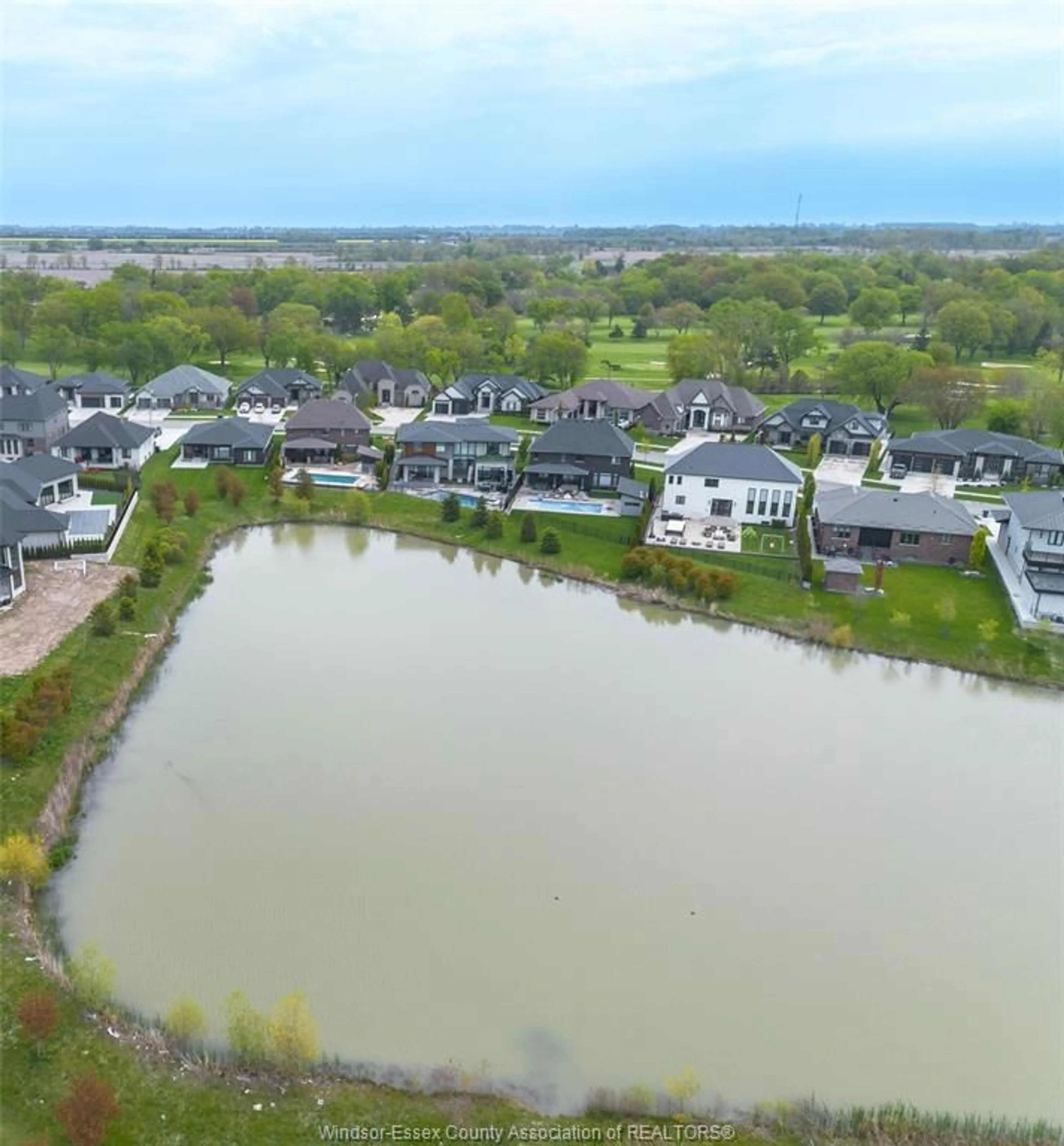 A pic from outside/outdoor area/front of a property/back of a property/a pic from drone, water/lake/river/ocean view for 7 CYPRESS POINTE, Leamington Ontario N8H 5R2