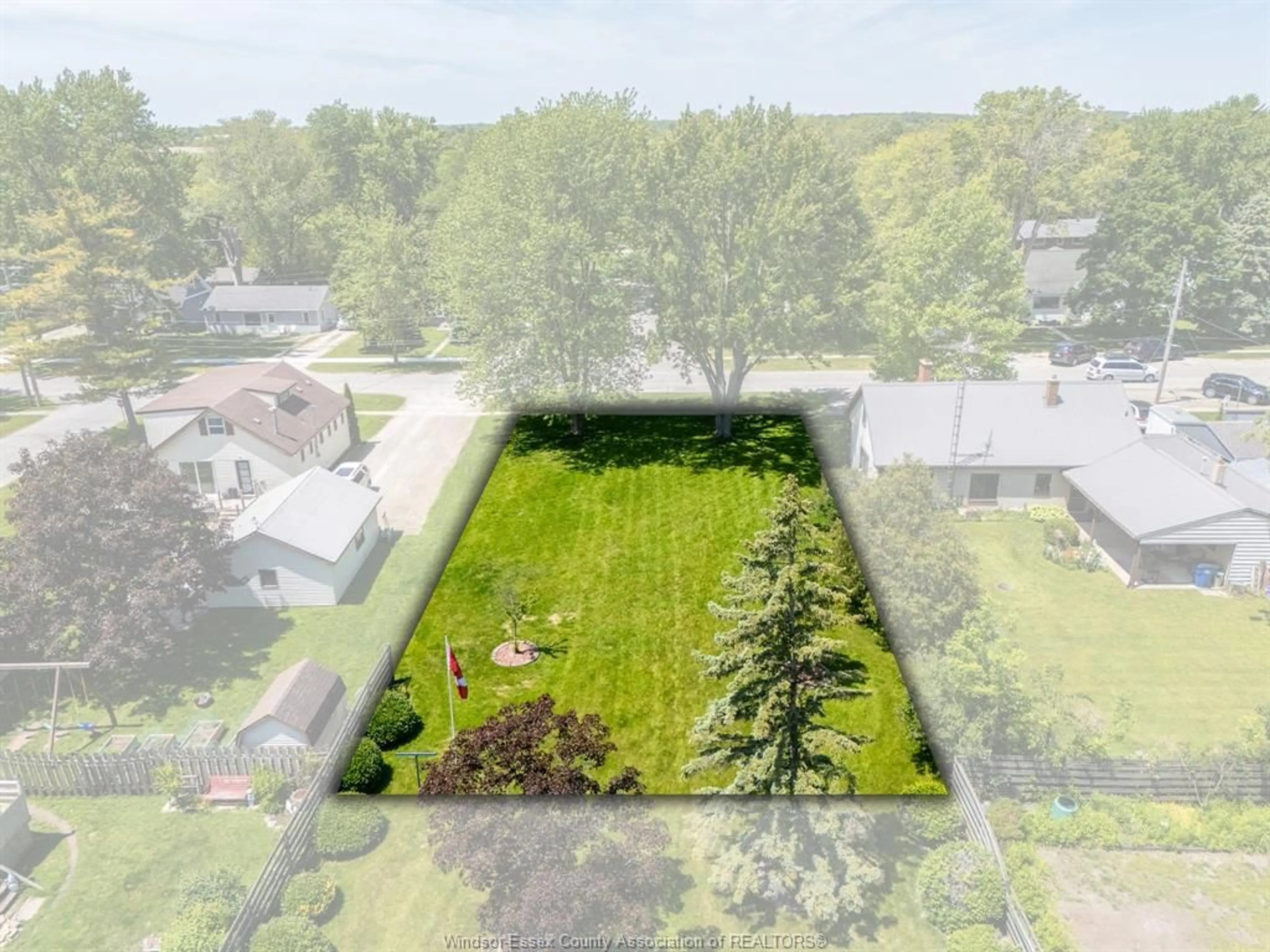 A pic from outside/outdoor area/front of a property/back of a property/a pic from drone, unknown for 105 Baird, Wheatley Ontario N0P 2P0
