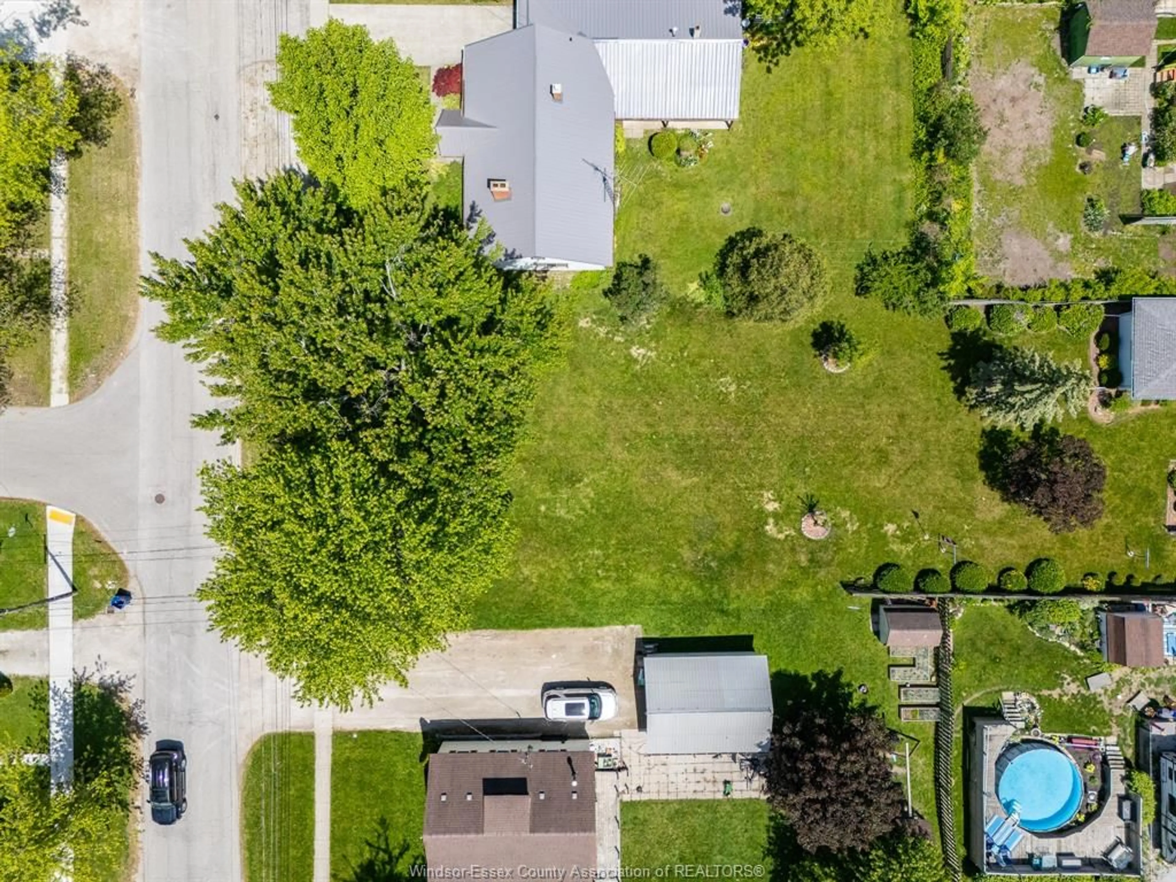 A pic from outside/outdoor area/front of a property/back of a property/a pic from drone, street for 105 Baird, Wheatley Ontario N0P 2P0
