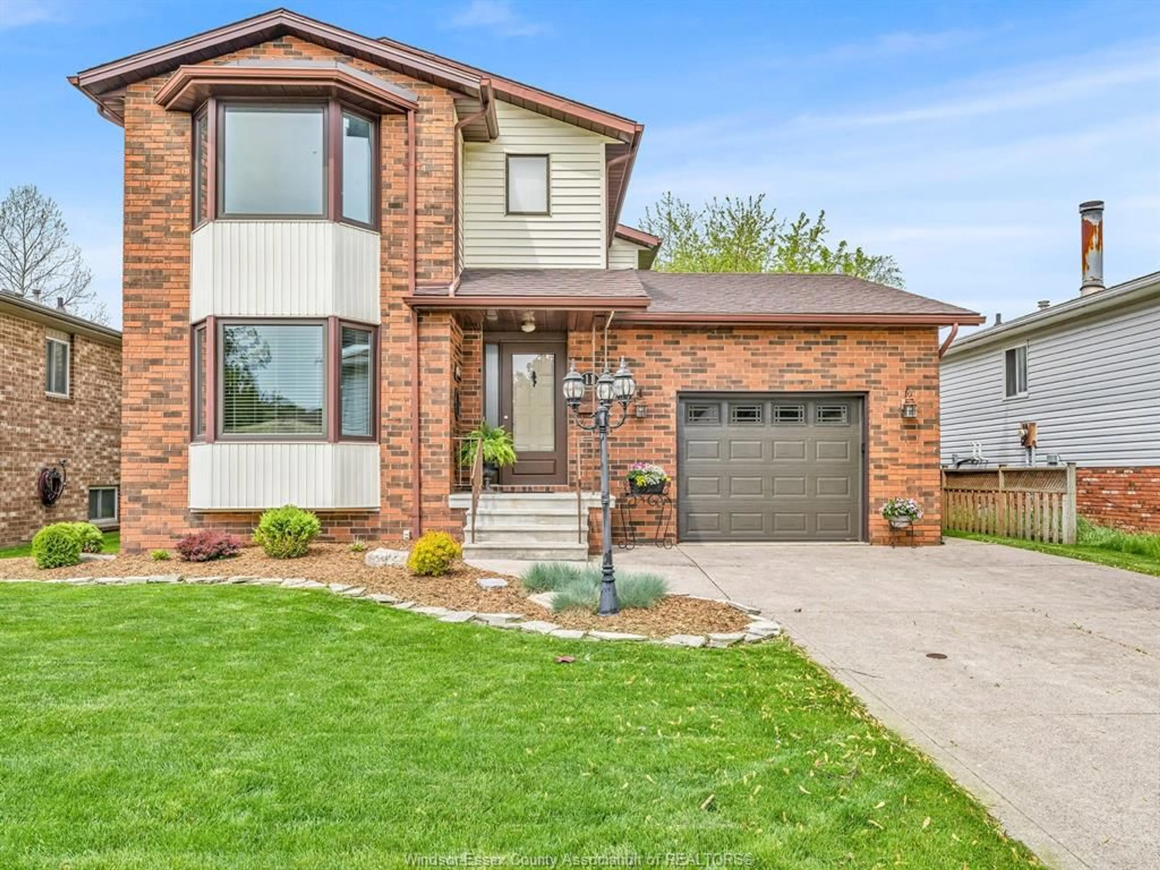 Home with brick exterior material, street for 11 Rudgate Lane, Leamington Ontario N8H 4Y9