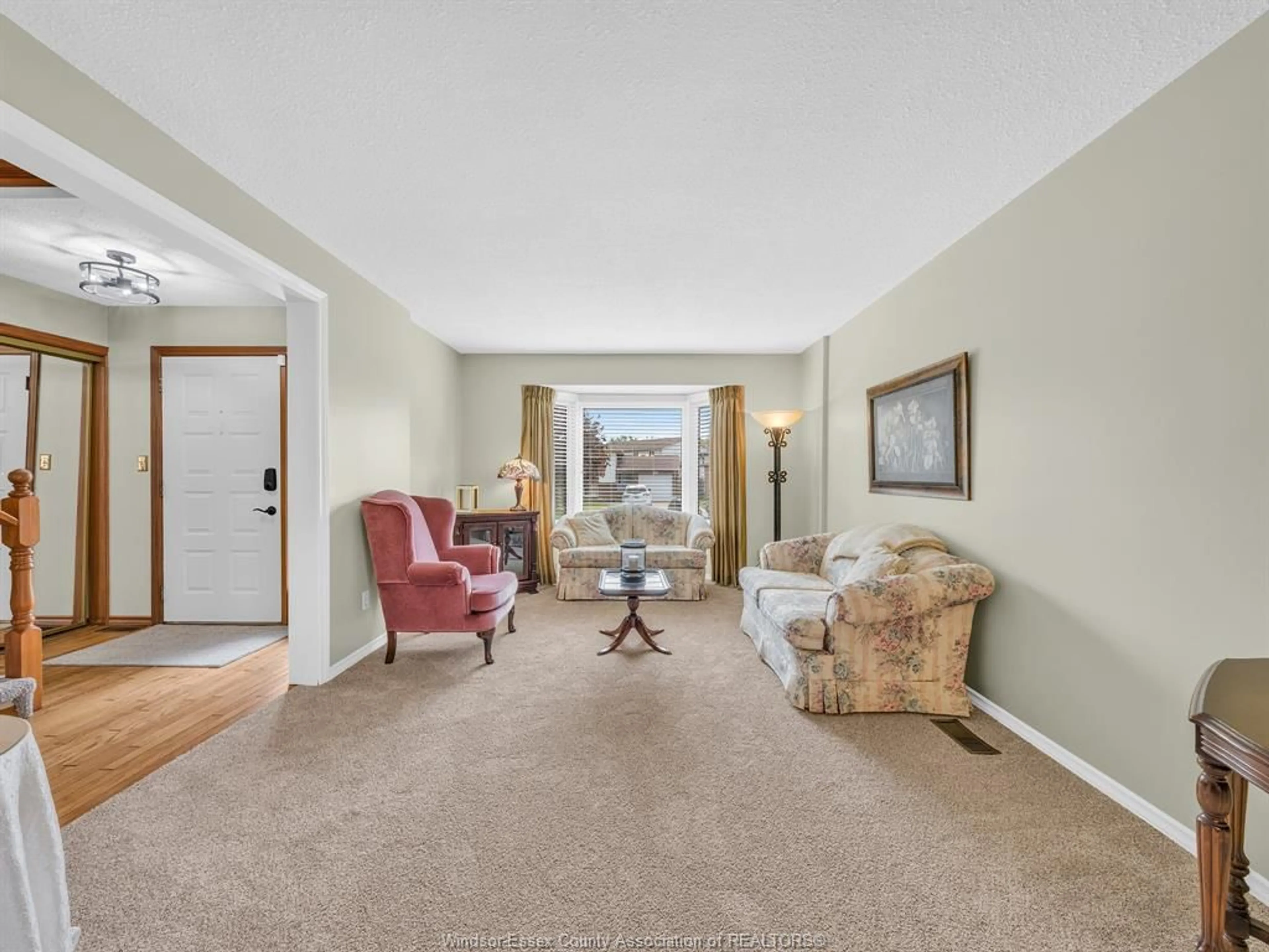 Living room with furniture, unknown for 11 Rudgate Lane, Leamington Ontario N8H 4Y9