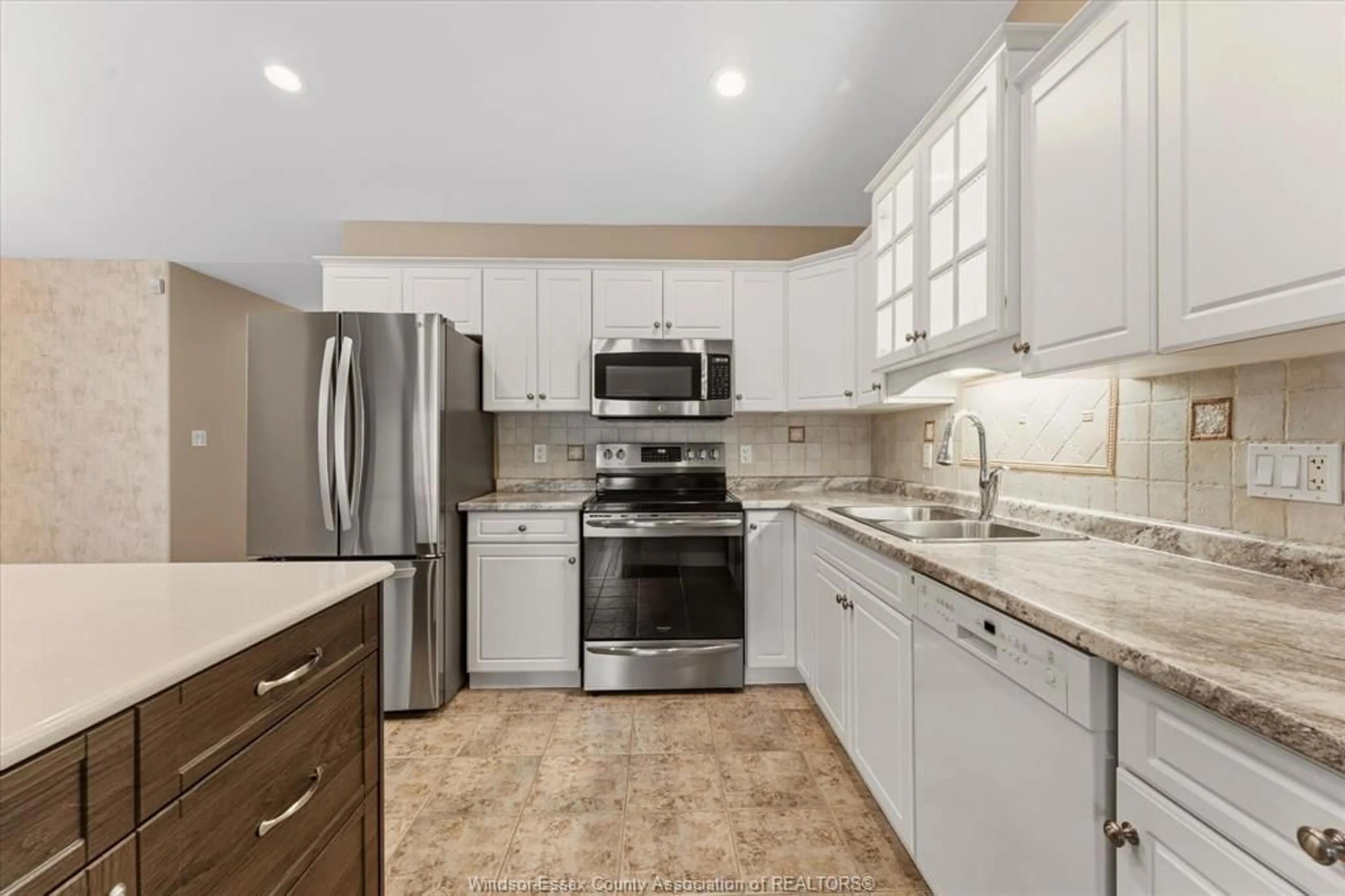 Open concept kitchen, ceramic/tile floor for 2035 Morningstar Ave, Windsor Ontario N8P 1W5