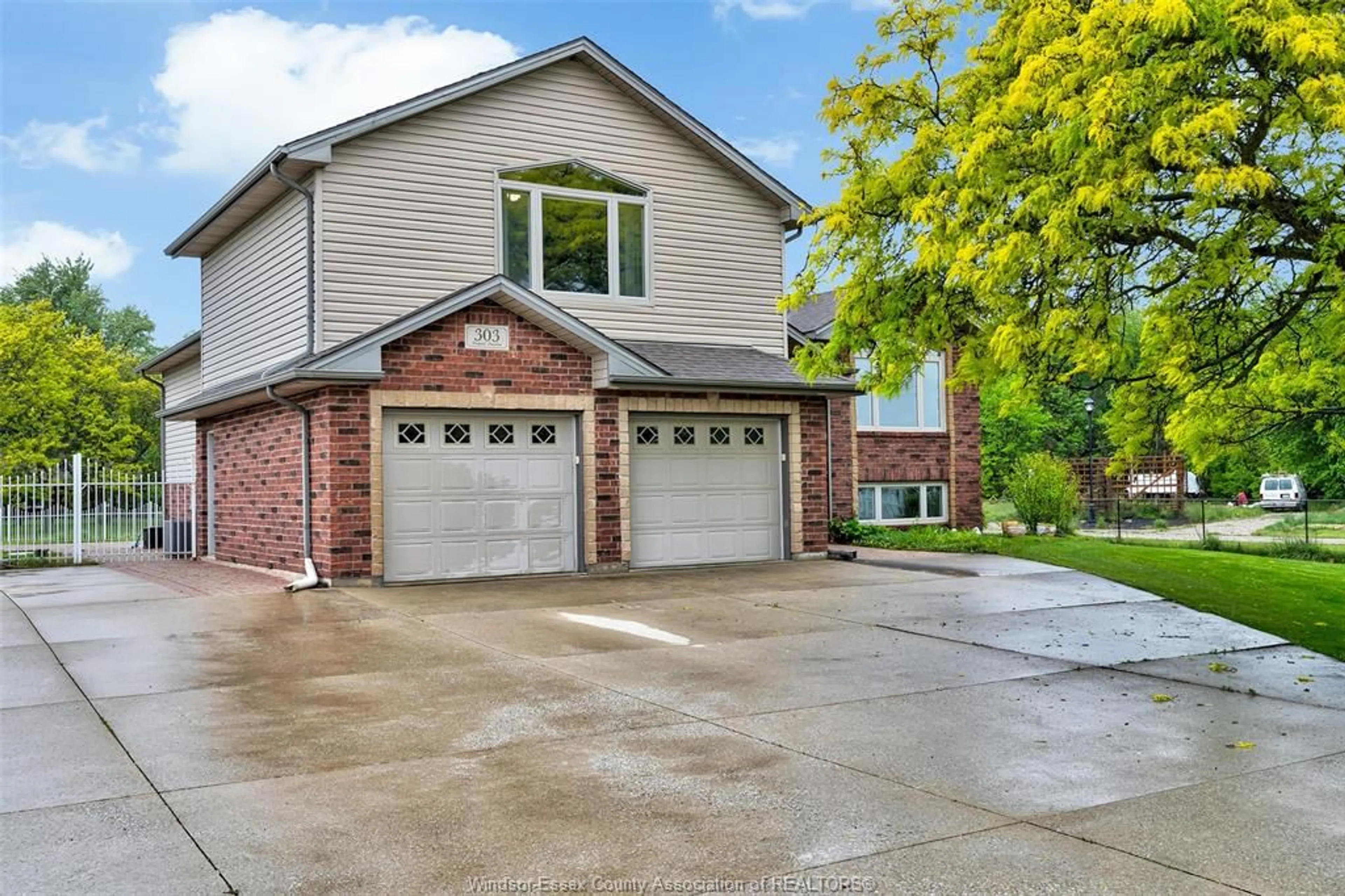Home with brick exterior material, street for 303 Gosfield Townline, Essex Ontario N8M 2X5
