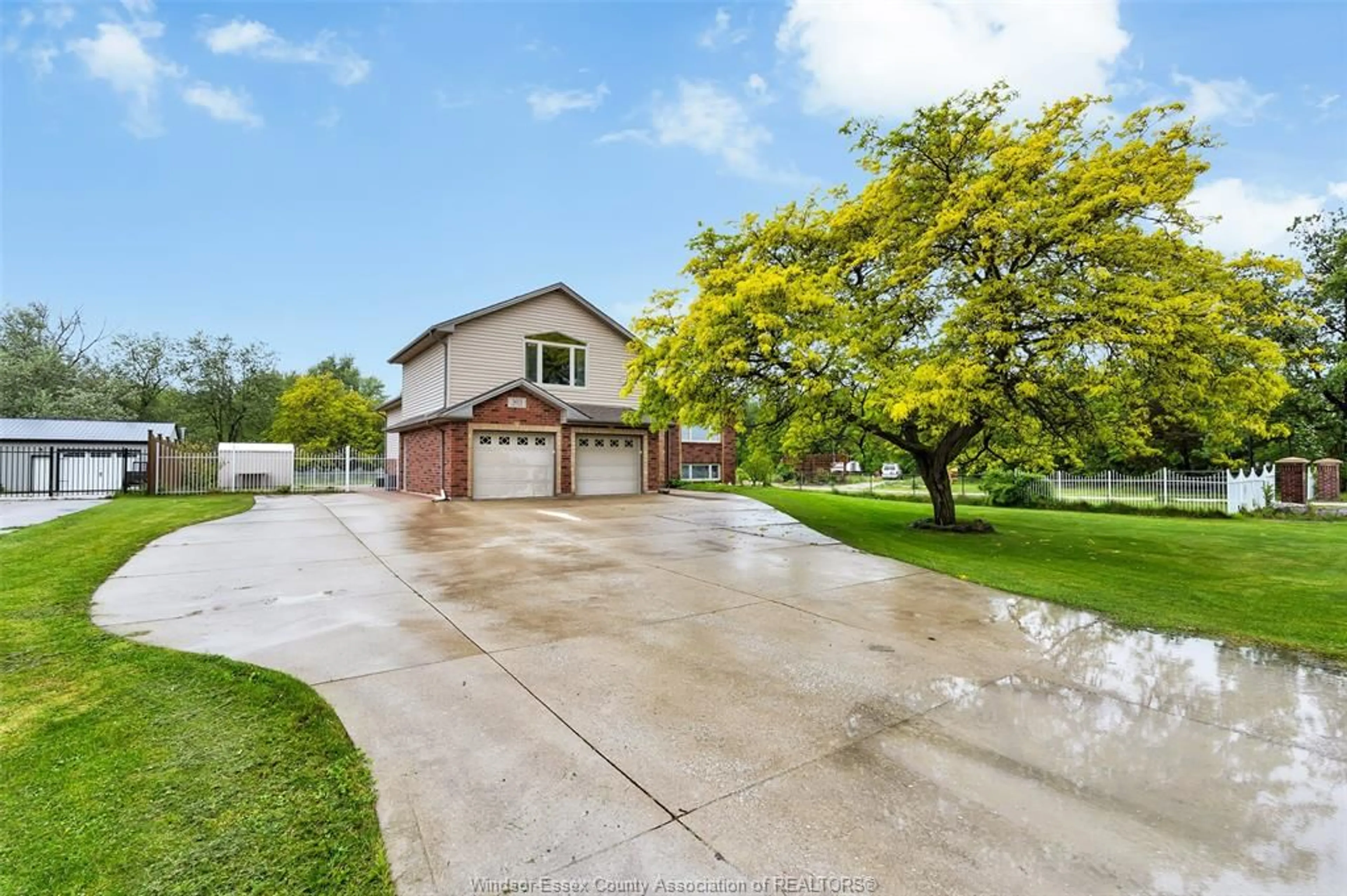 A pic from outside/outdoor area/front of a property/back of a property/a pic from drone, water/lake/river/ocean view for 303 Gosfield Townline, Essex Ontario N8M 2X5