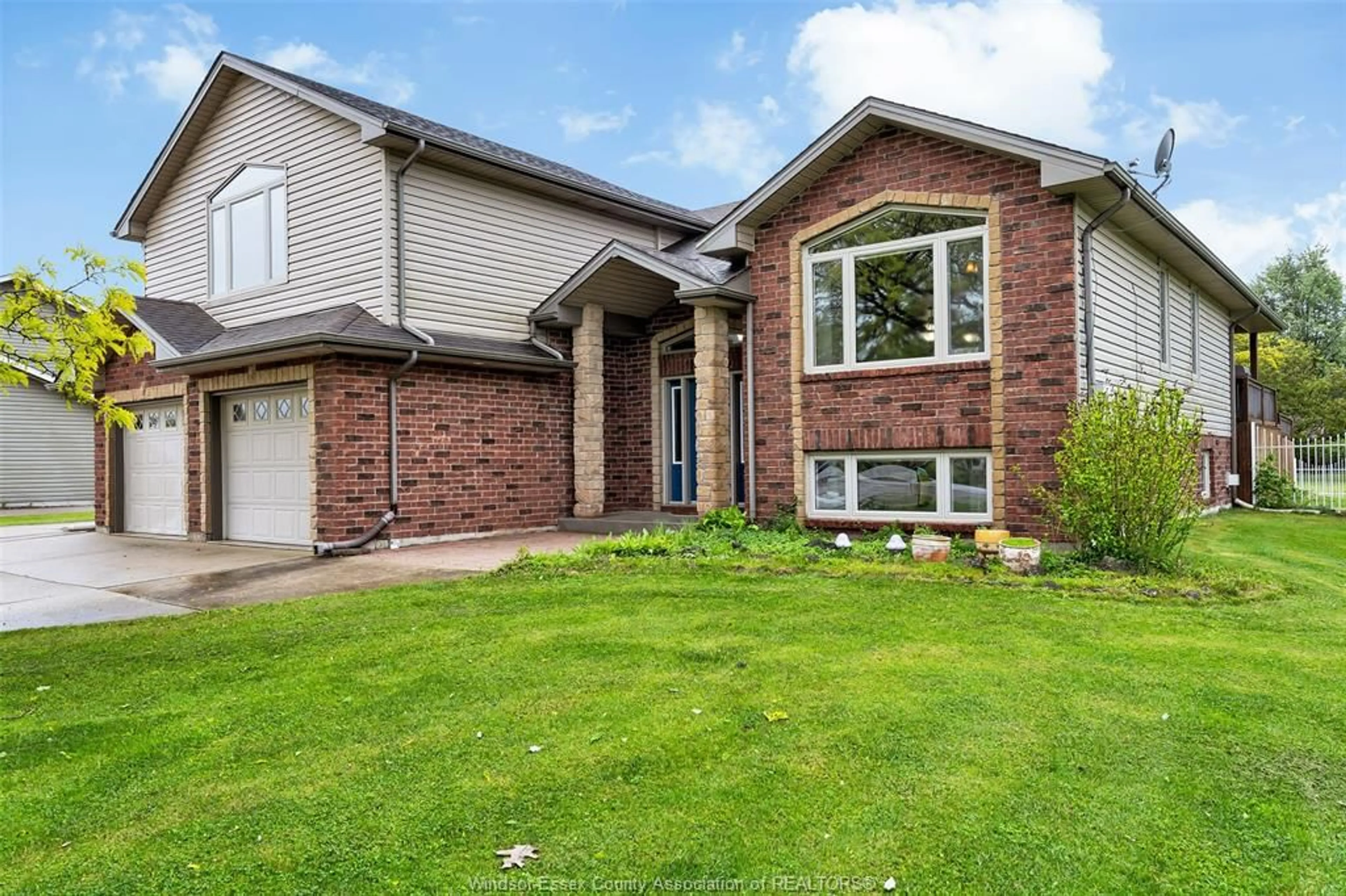 Home with brick exterior material, street for 303 Gosfield Townline, Essex Ontario N8M 2X5