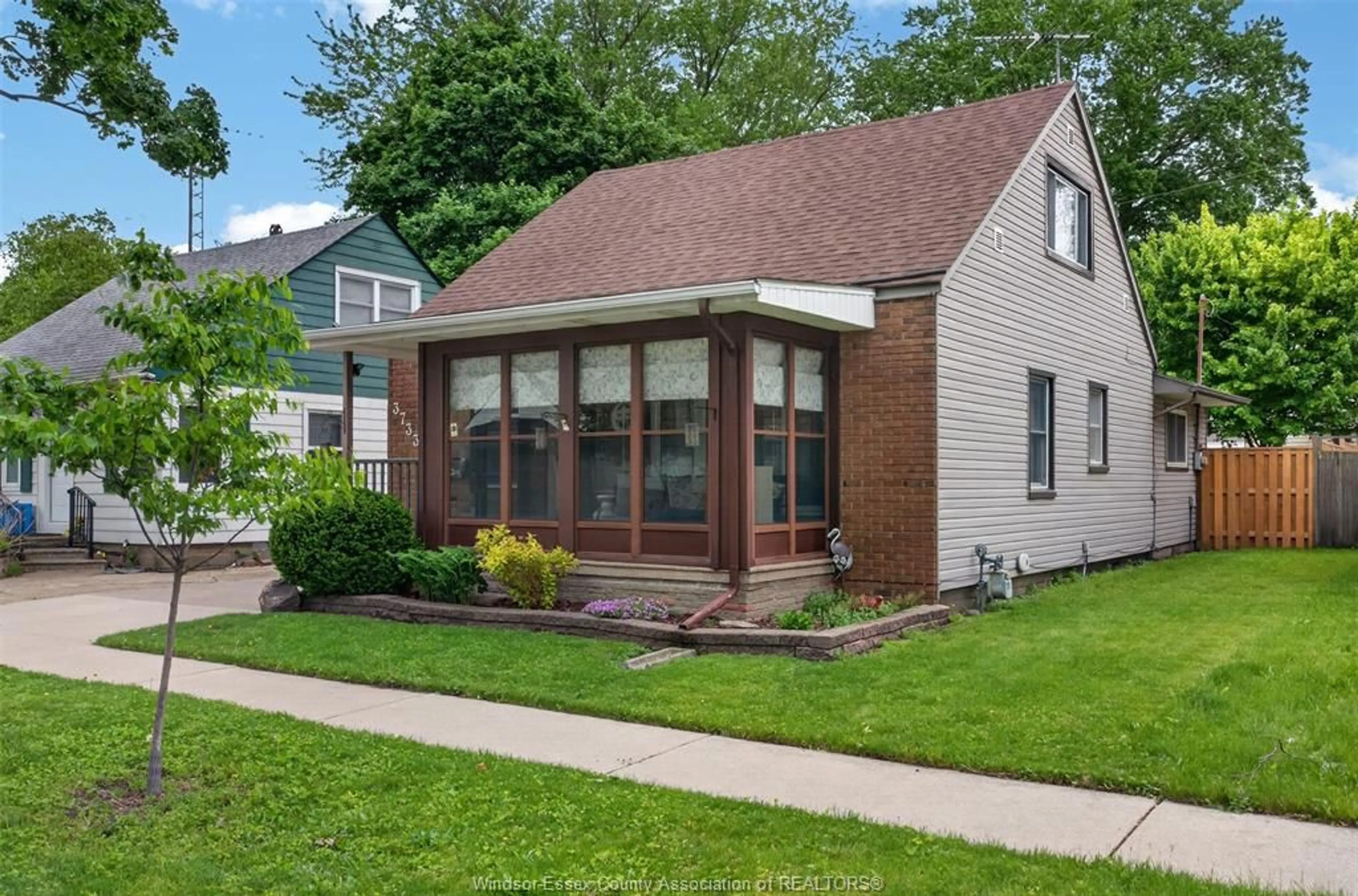 Home with vinyl exterior material, street for 3733 VAUGHAN St, Windsor Ontario N9C 1Z6