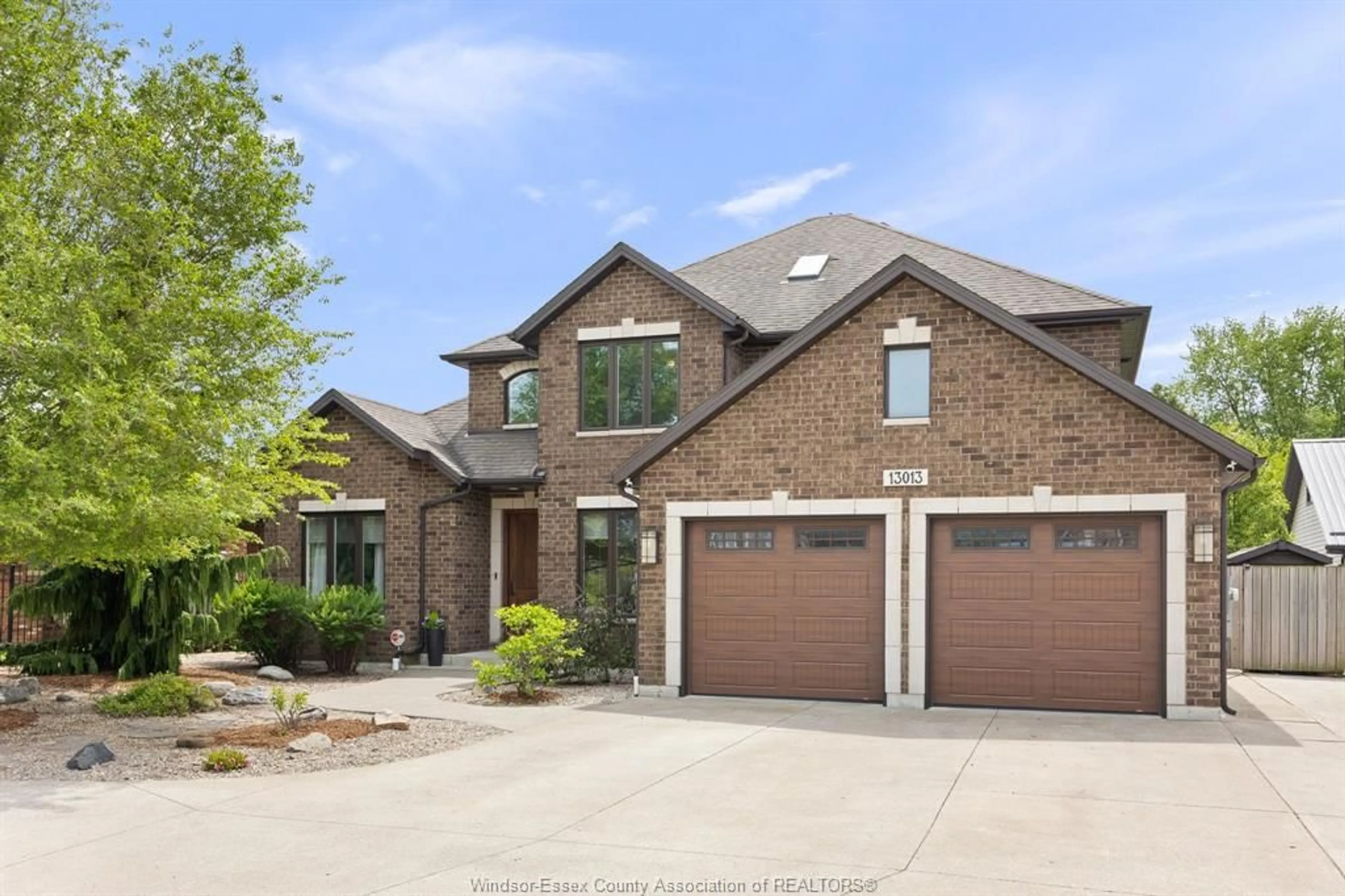 Home with brick exterior material, street for 13013 RIVERSIDE Dr, Tecumseh Ontario N8N 2L9