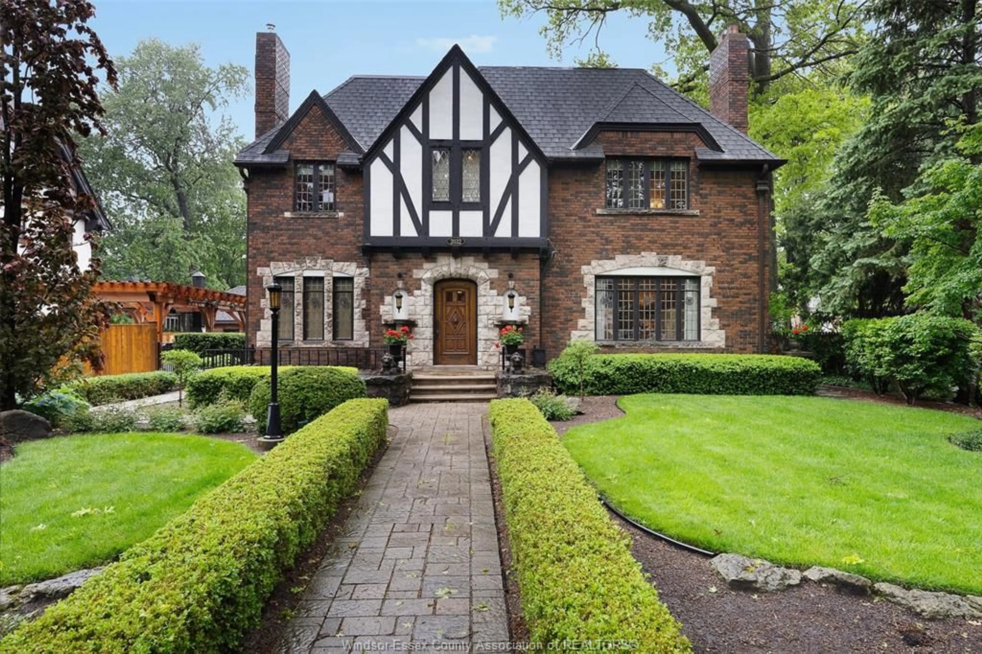 Home with brick exterior material, street for 2032 WILLISTEAD Cres, Windsor Ontario N8Y 1K5