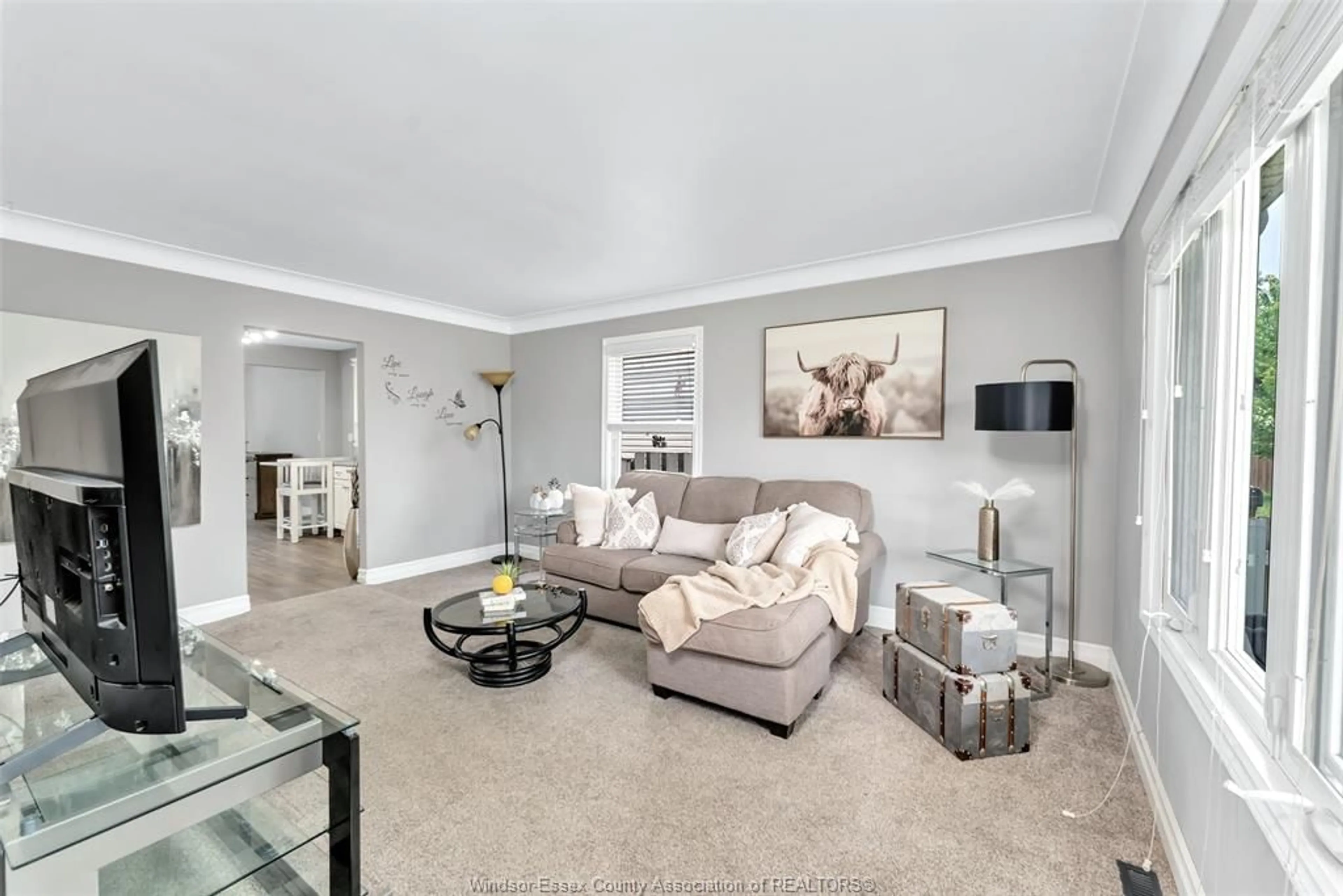 Living room with furniture, ceramic/tile floor for 1857 CENTRAL Ave, Windsor Ontario N8W 4H6