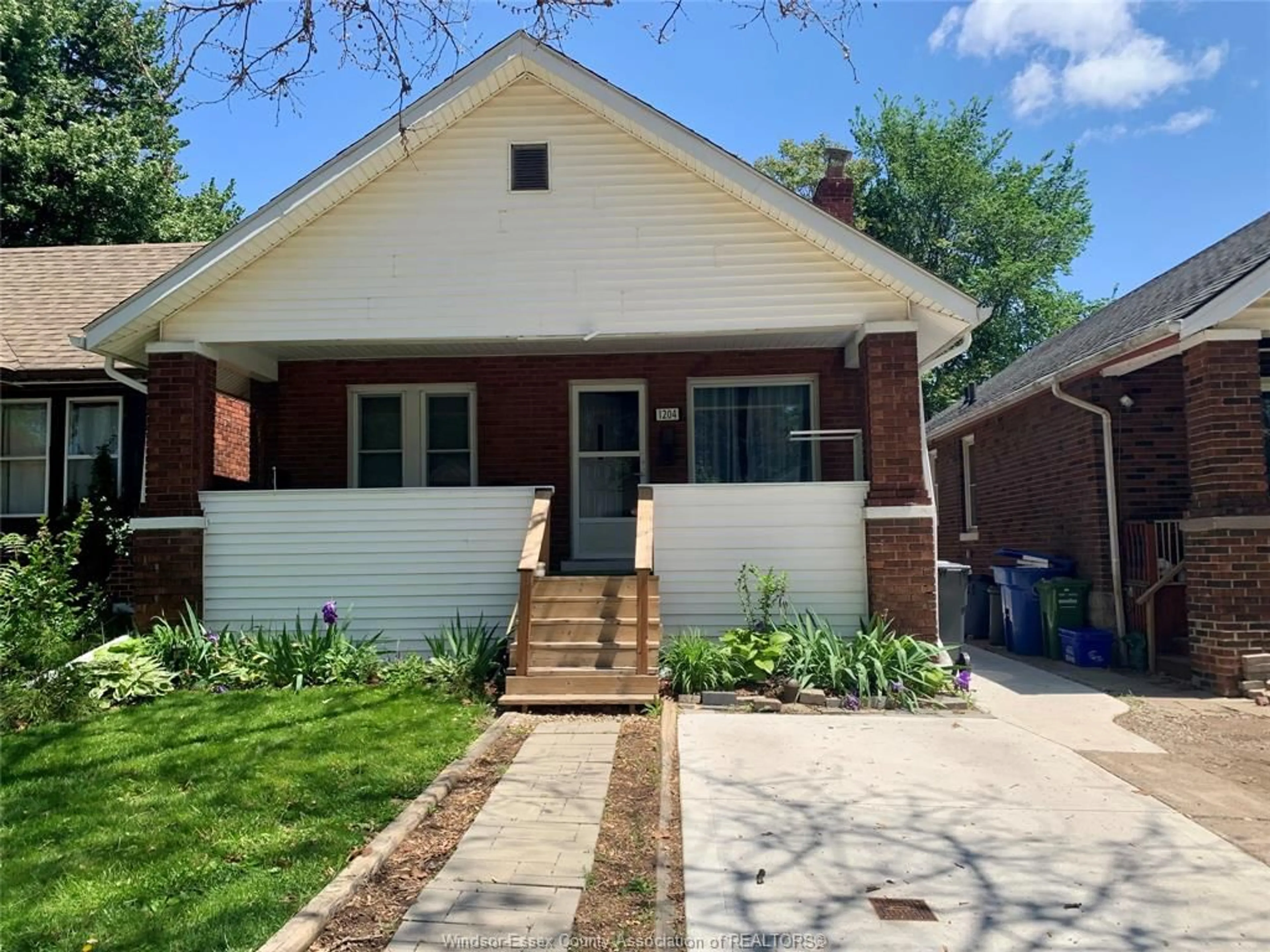 Home with brick exterior material, street for 1204 WIGLE Ave, Windsor Ontario N9C 3N1