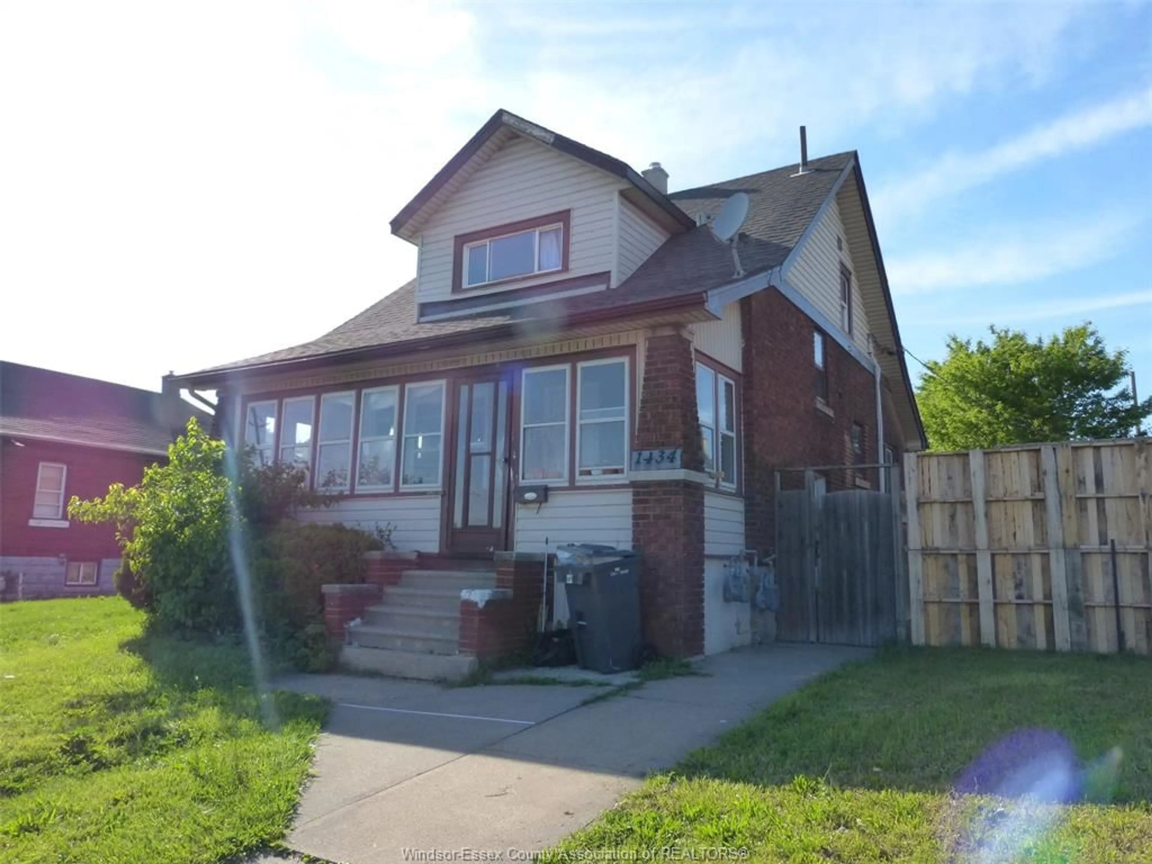 Home with brick exterior material, street for 1434 TECUMSEH Blvd, Windsor Ontario N8X 1H5