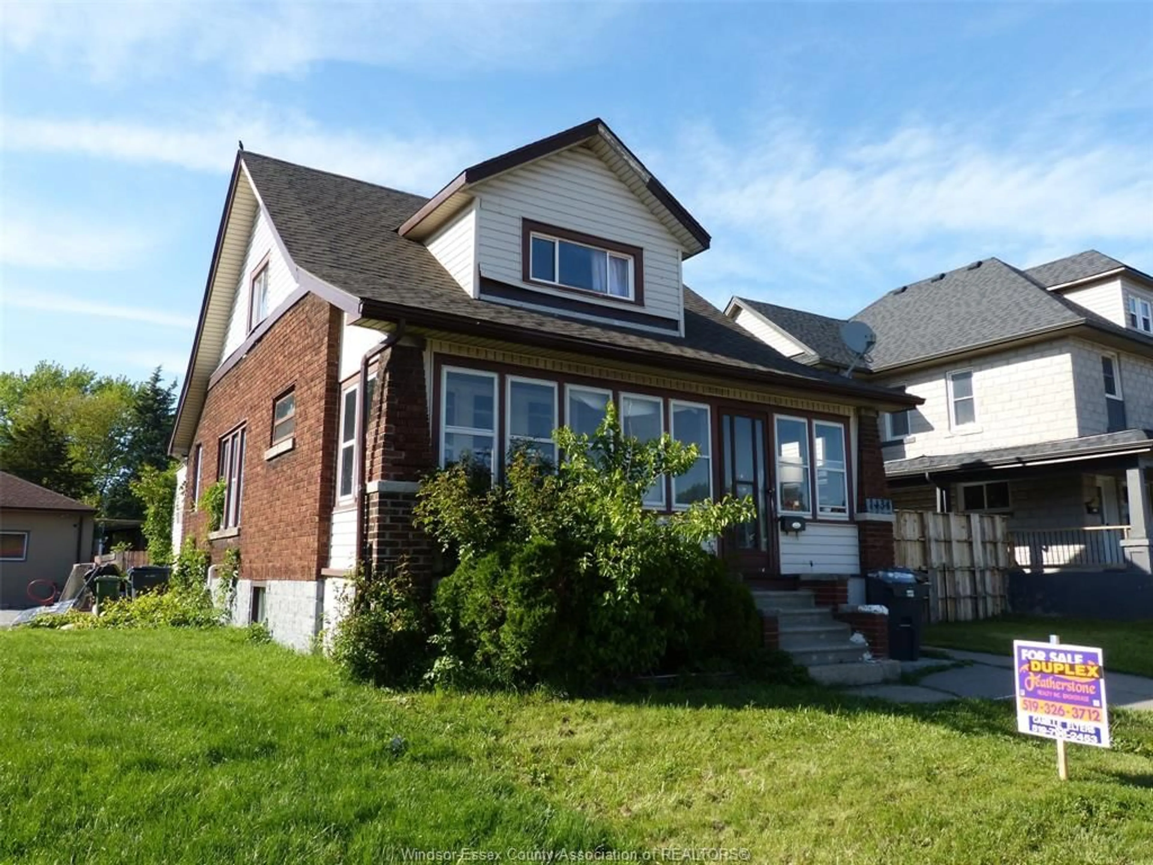 Home with brick exterior material, street for 1434 TECUMSEH Blvd, Windsor Ontario N8X 1H5