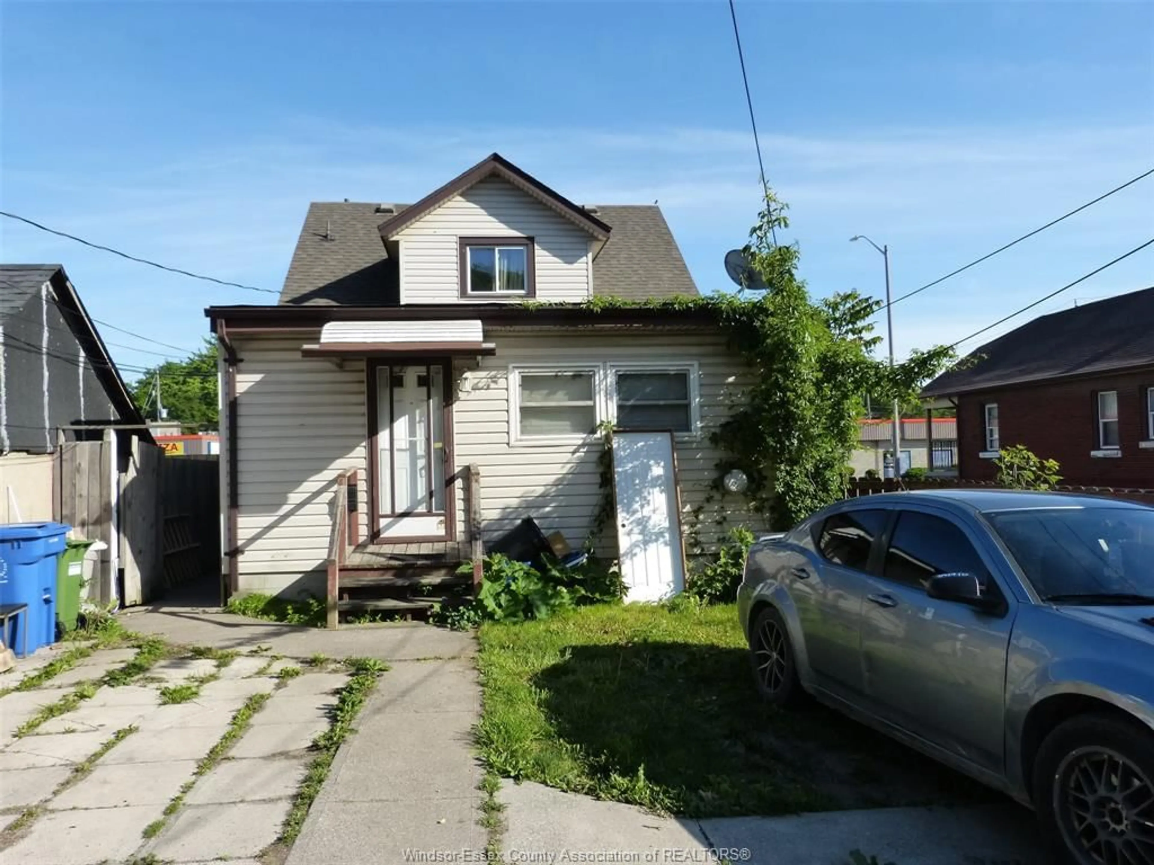 A pic from outside/outdoor area/front of a property/back of a property/a pic from drone, street for 1434 TECUMSEH Blvd, Windsor Ontario N8X 1H5