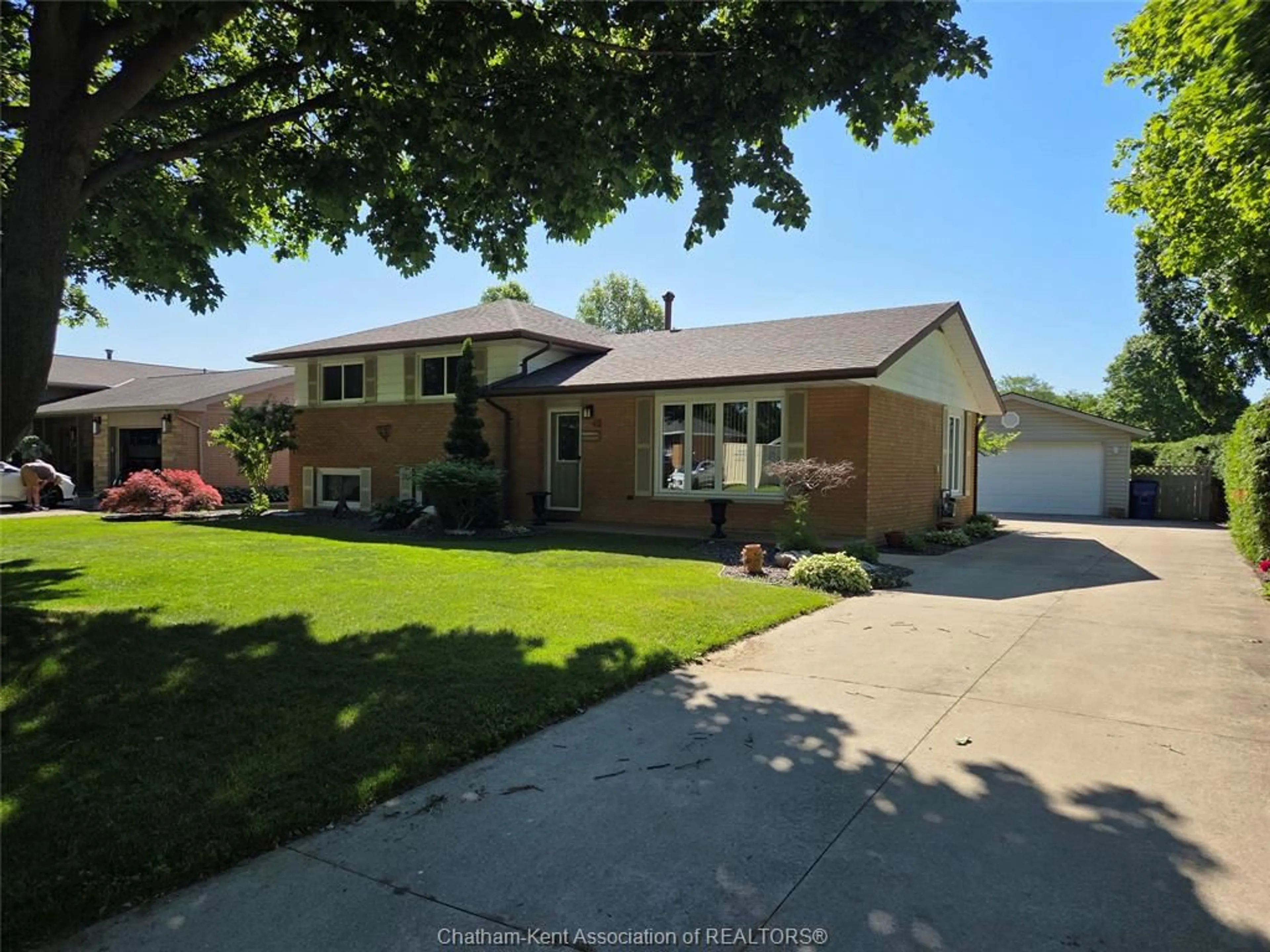 Home with vinyl exterior material, street for 48 PARRY Dr, Chatham Ontario N7L 2J2