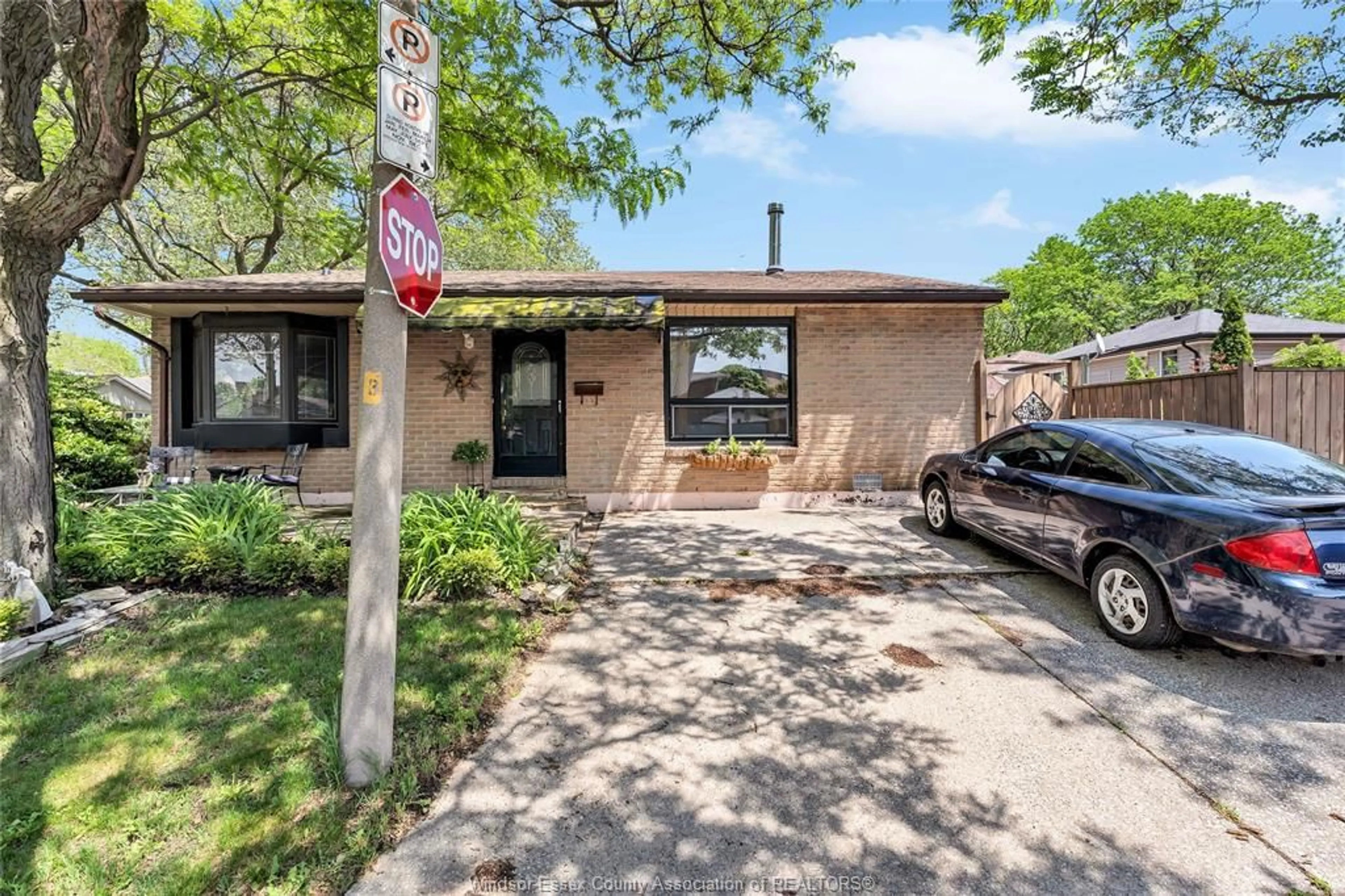 Home with brick exterior material, street for 8315 ENFIELD Pl, Windsor Ontario N8S 4M8
