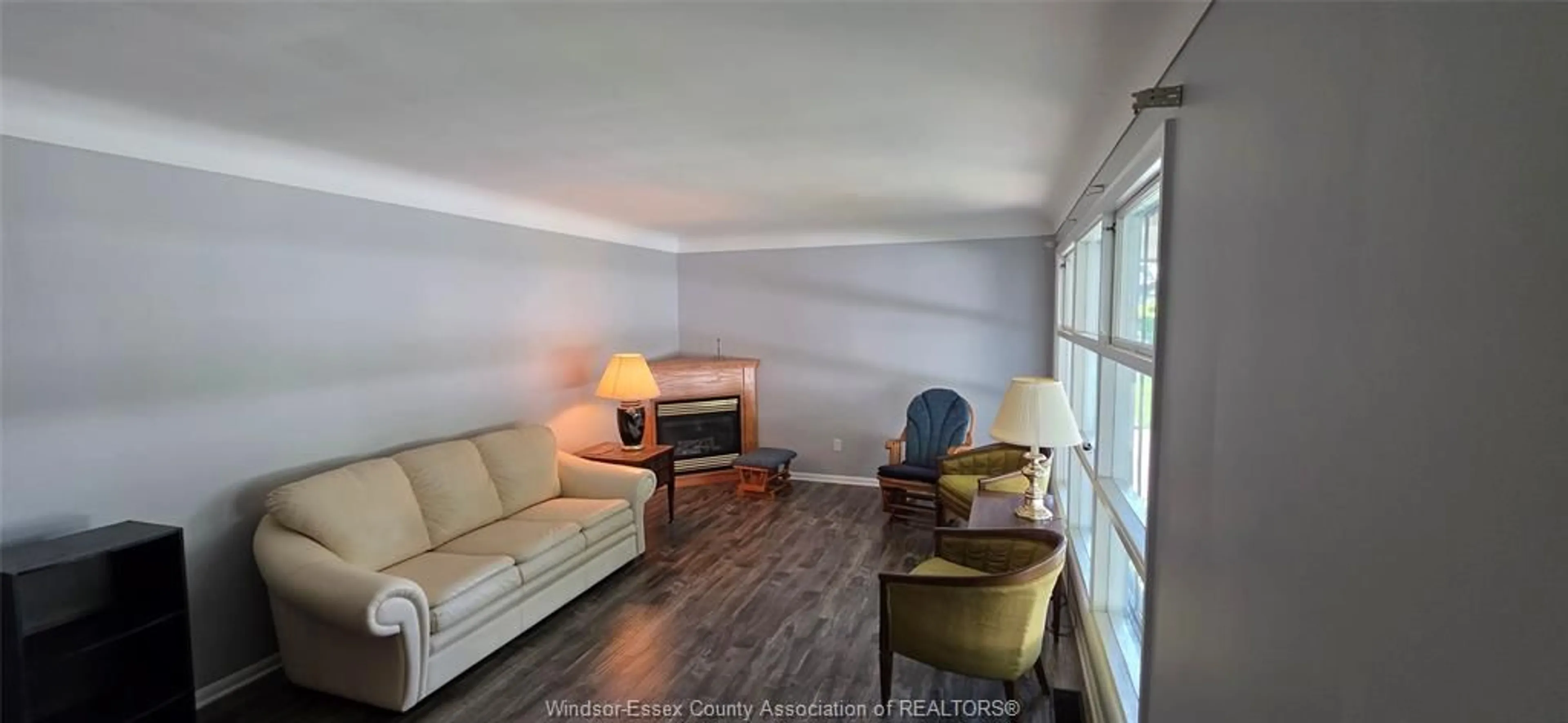Living room with furniture, wood/laminate floor for 113 VICTORY, LaSalle Ontario N9J 1V5