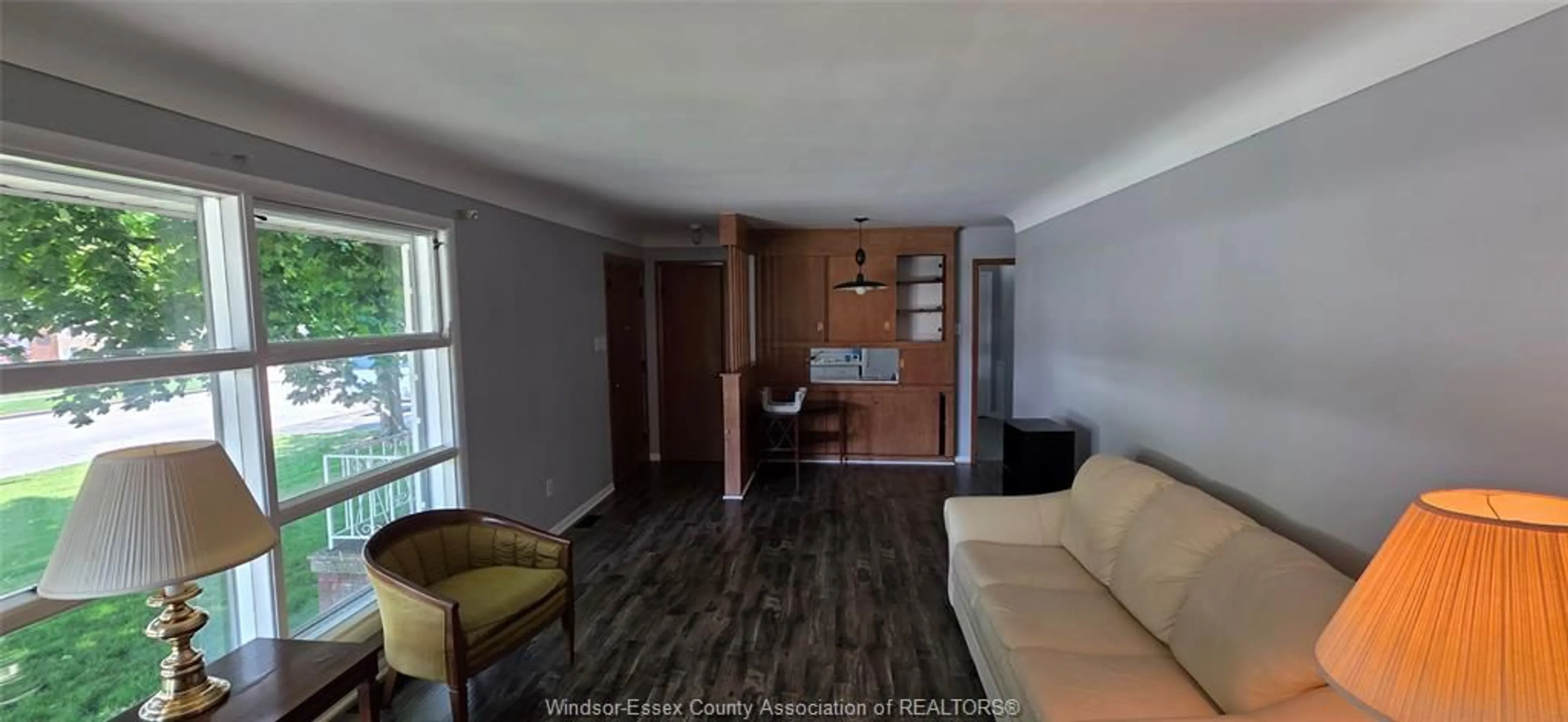 Living room with furniture, wood/laminate floor for 113 VICTORY, LaSalle Ontario N9J 1V5