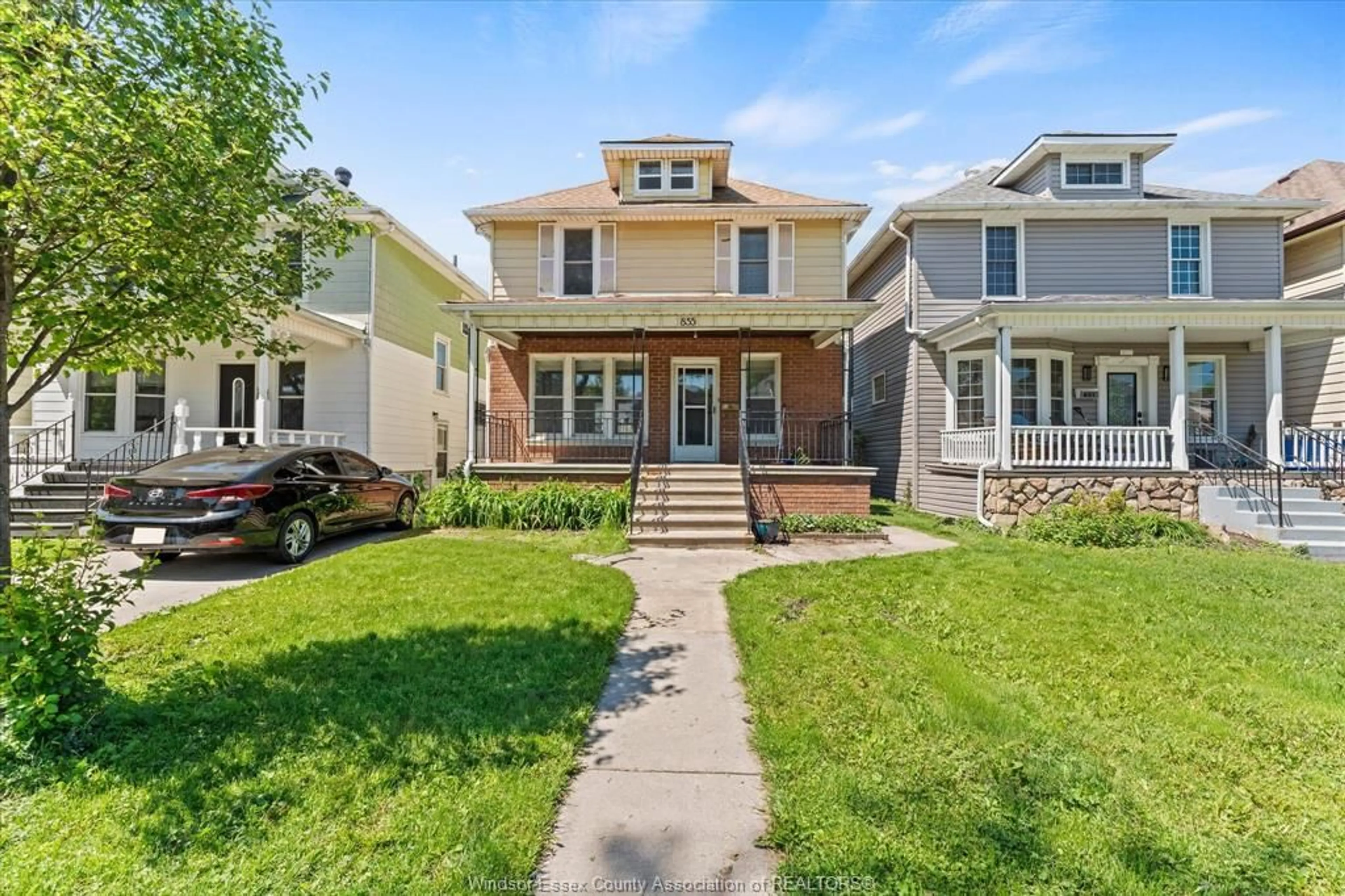 Home with vinyl exterior material, street for 855 HALL Ave, Windsor Ontario N9A 2M2