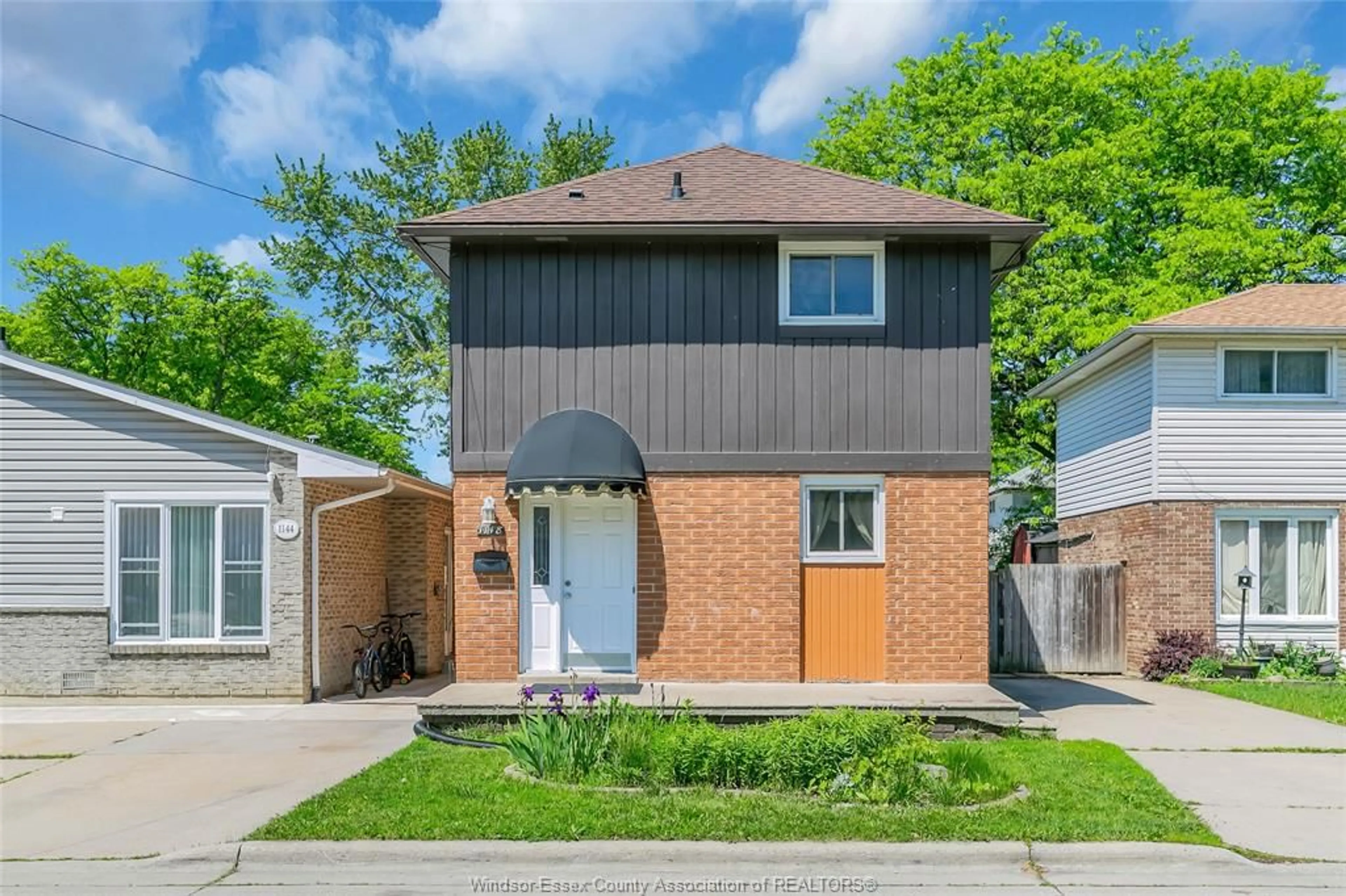 Home with brick exterior material, street for 1148 AIRE Pl, Windsor Ontario N8S 4G2