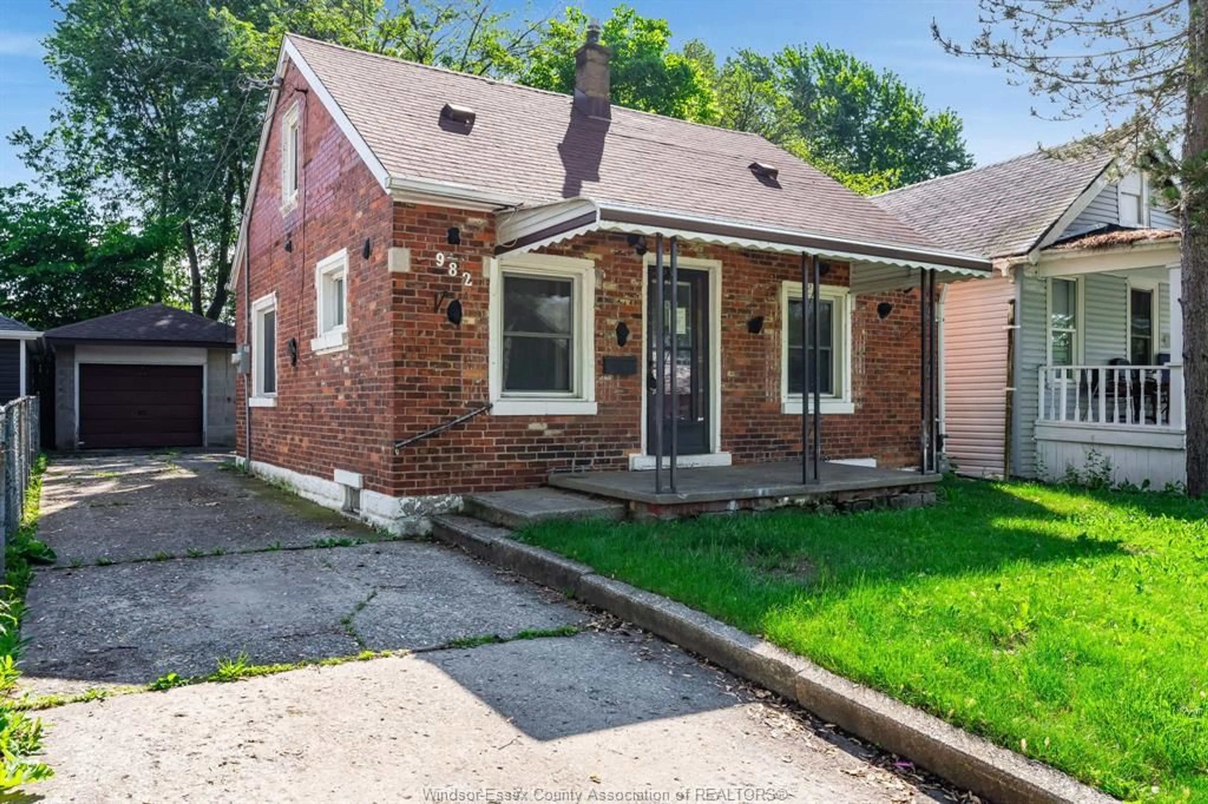 Home with brick exterior material, street for 982 Bridge, Windsor Ontario N9B 2N1