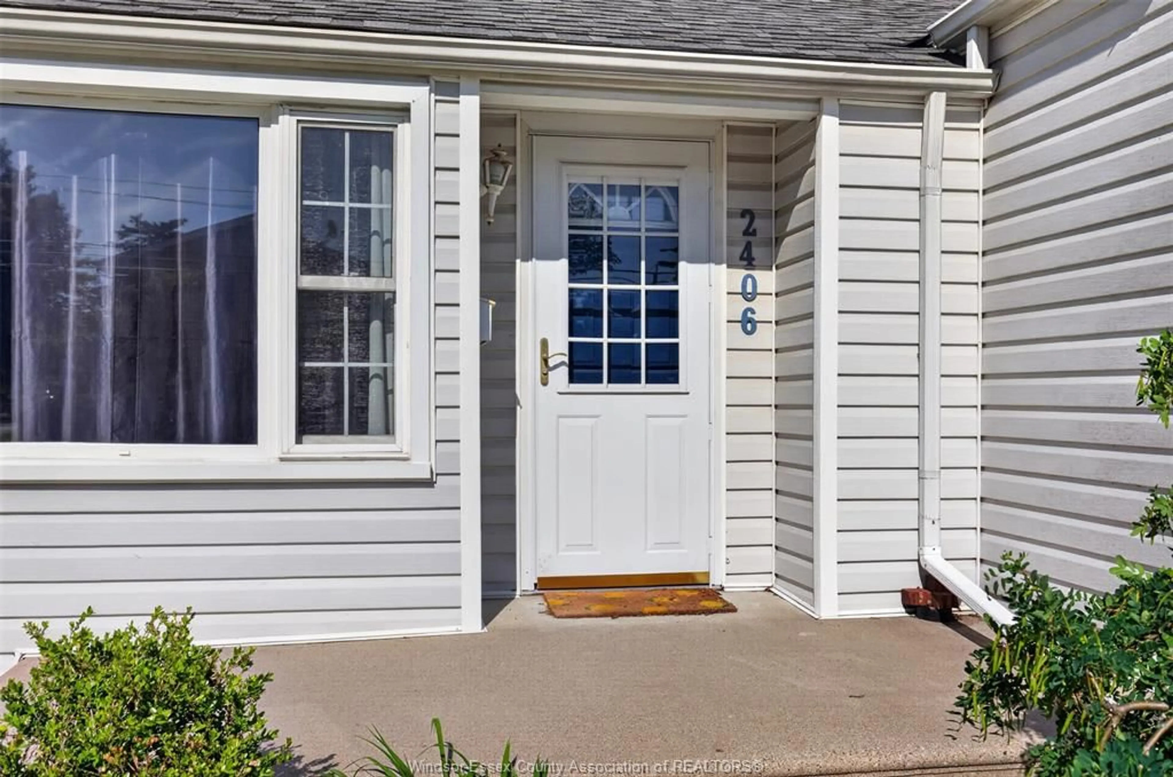 Home with vinyl exterior material, street for 2406 BYNG, Windsor Ontario N8W 3E8
