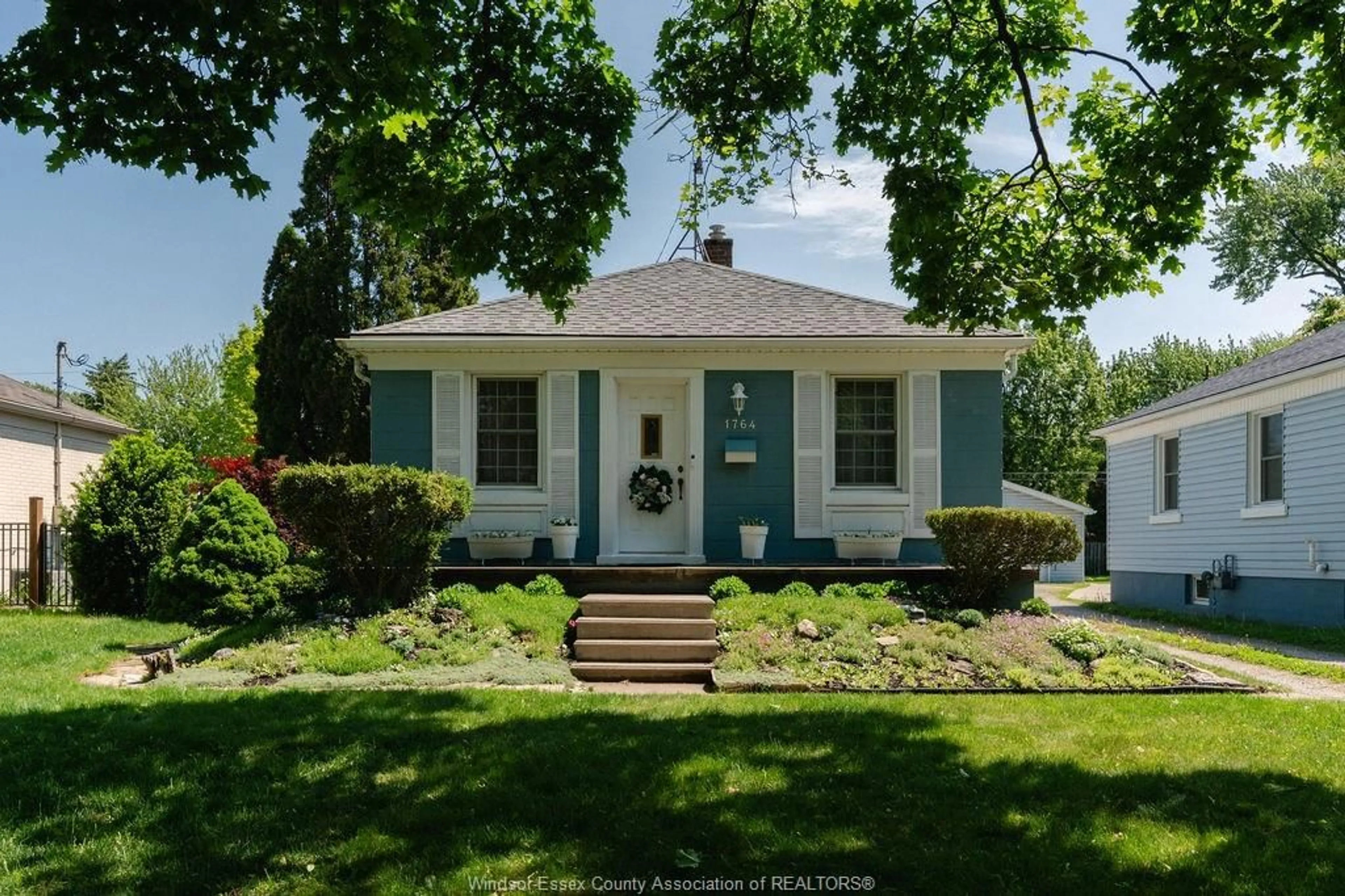 Home with vinyl exterior material, street for 1764 KILDARE Rd, Windsor Ontario N8W 2W6