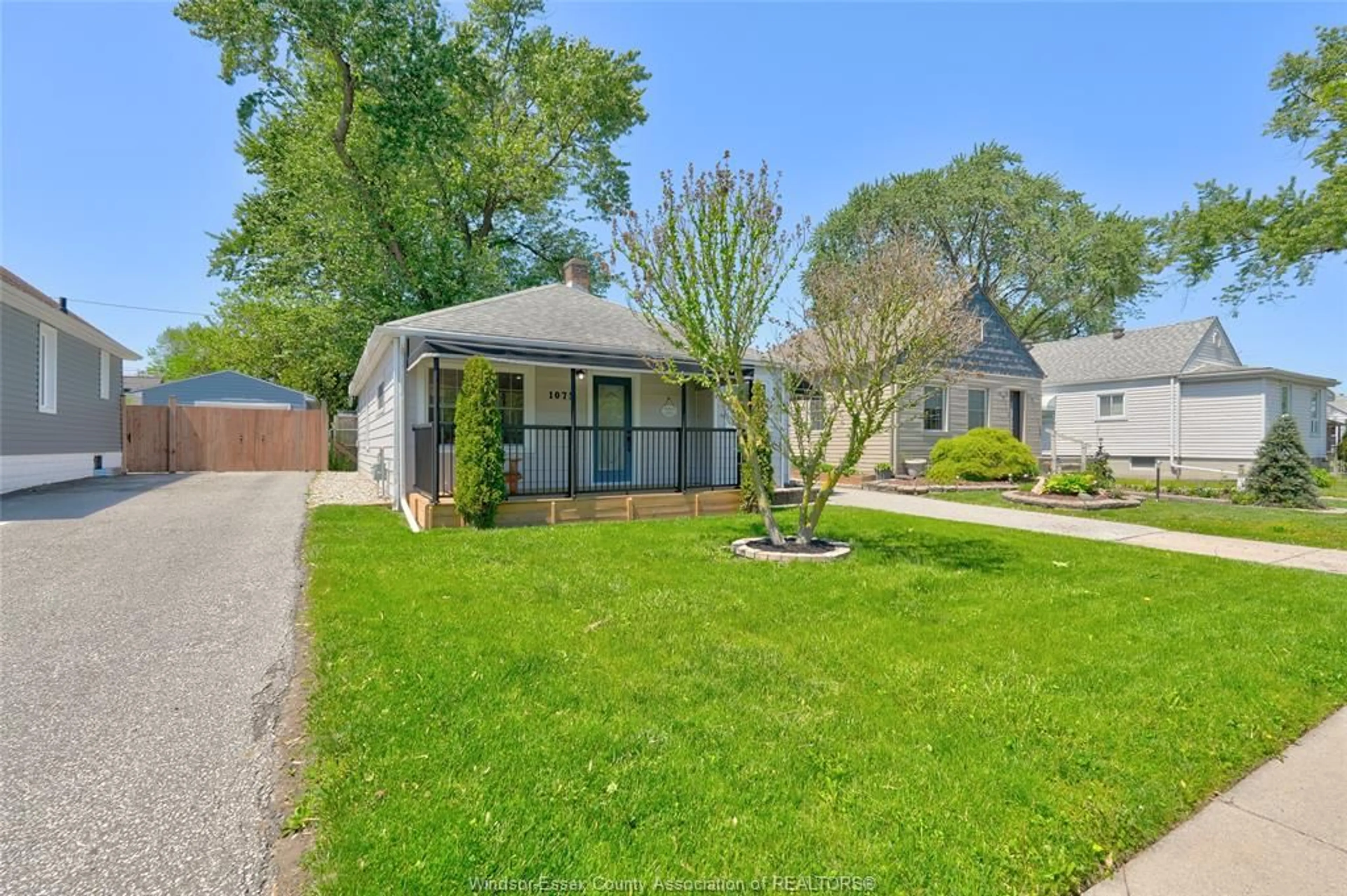 A pic from outside/outdoor area/front of a property/back of a property/a pic from drone, street for 1075 ESDRAS Pl, Windsor Ontario N8S 2N1