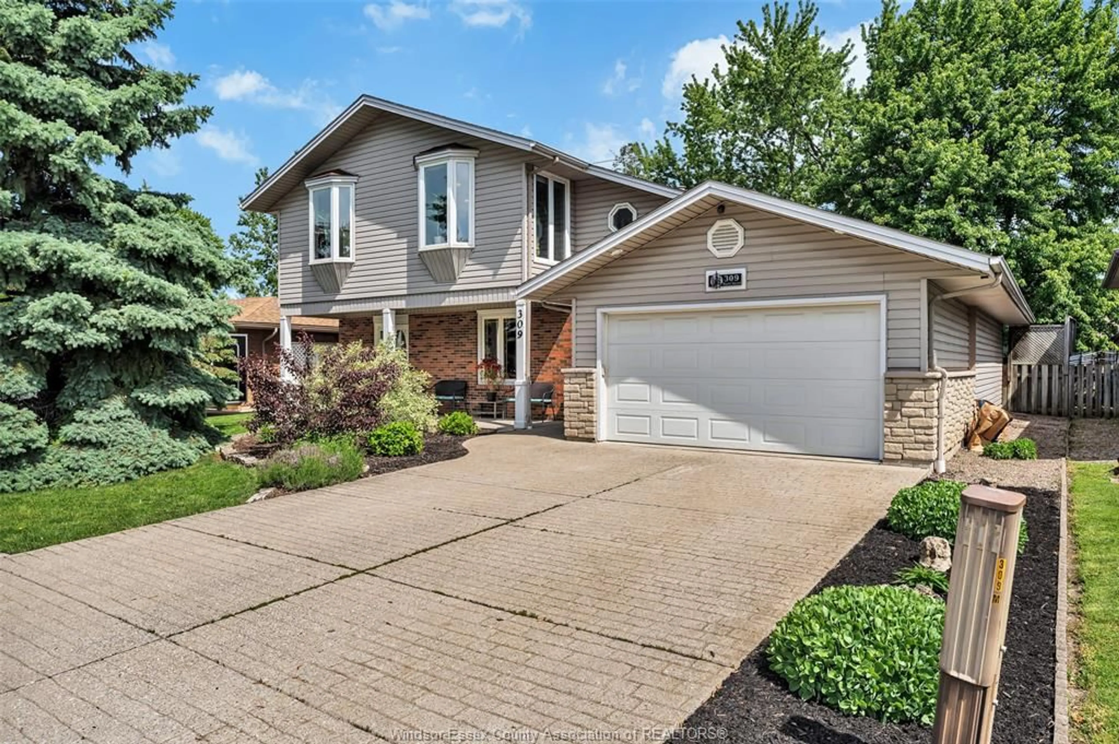 Home with brick exterior material, street for 309 MARIE St, Lakeshore Ontario N0R 1A0