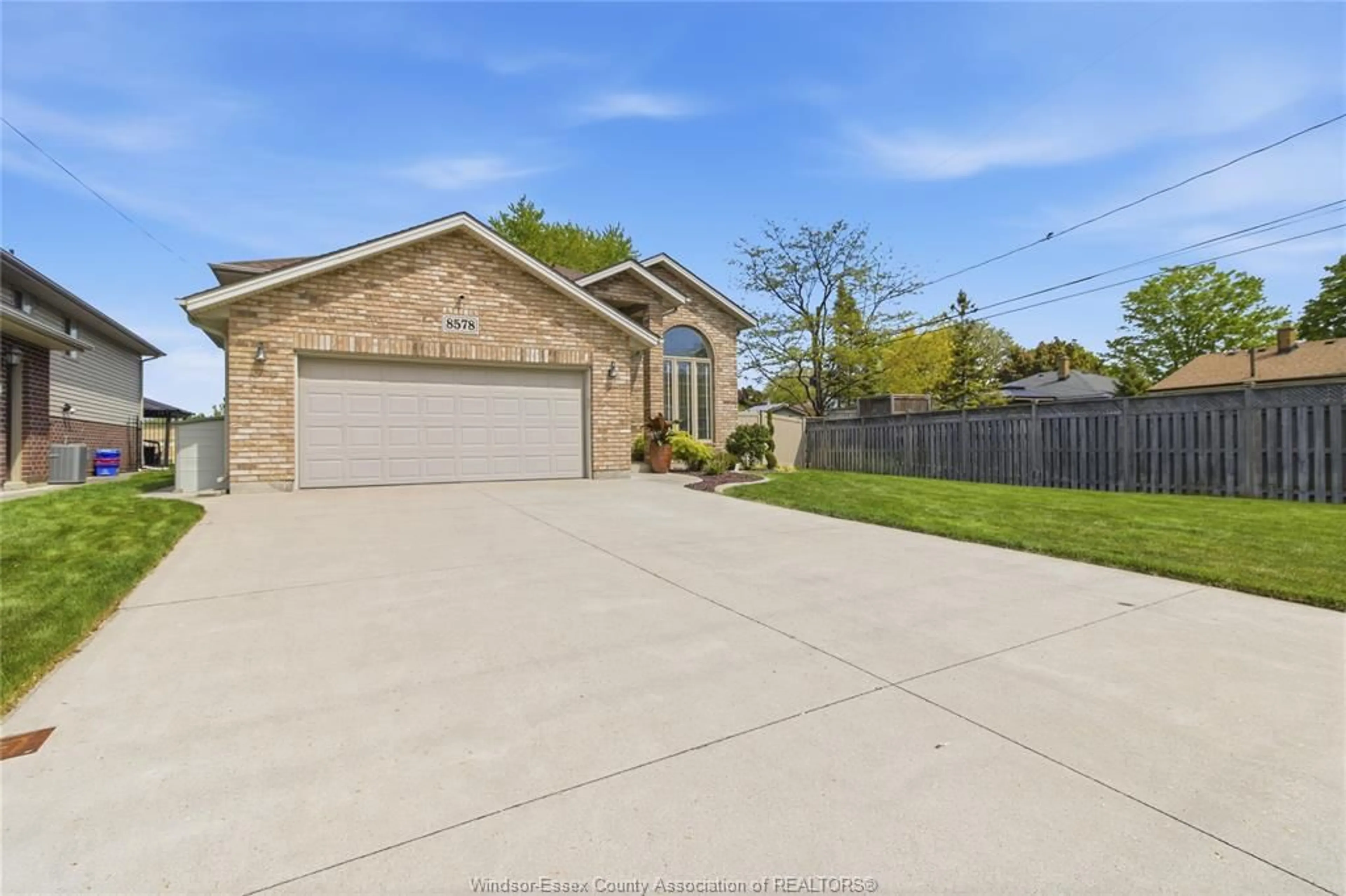 Home with brick exterior material, street for 8578 MENARD, Windsor Ontario N8S 4V4