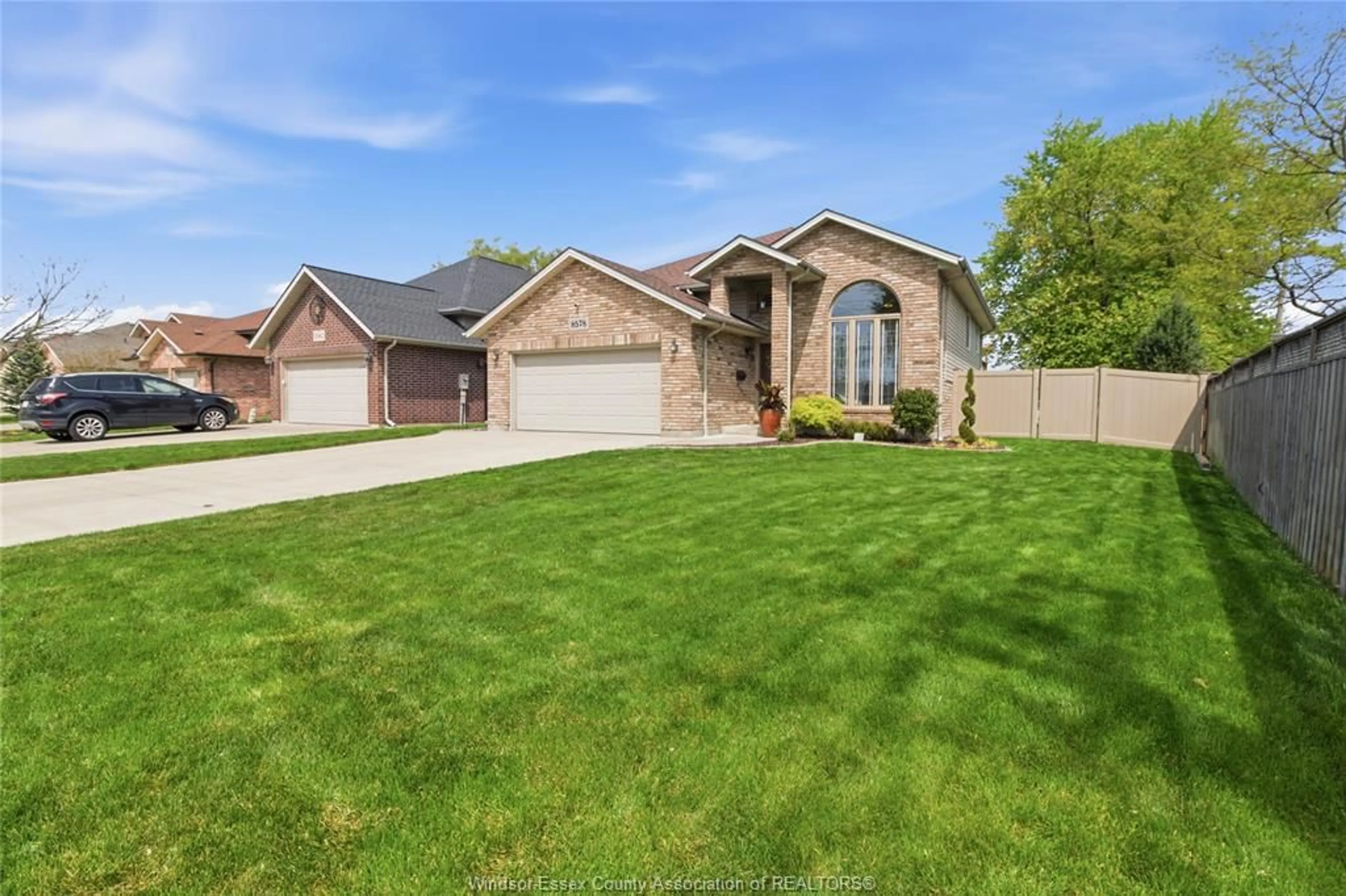 Home with brick exterior material, street for 8578 MENARD, Windsor Ontario N8S 4V4