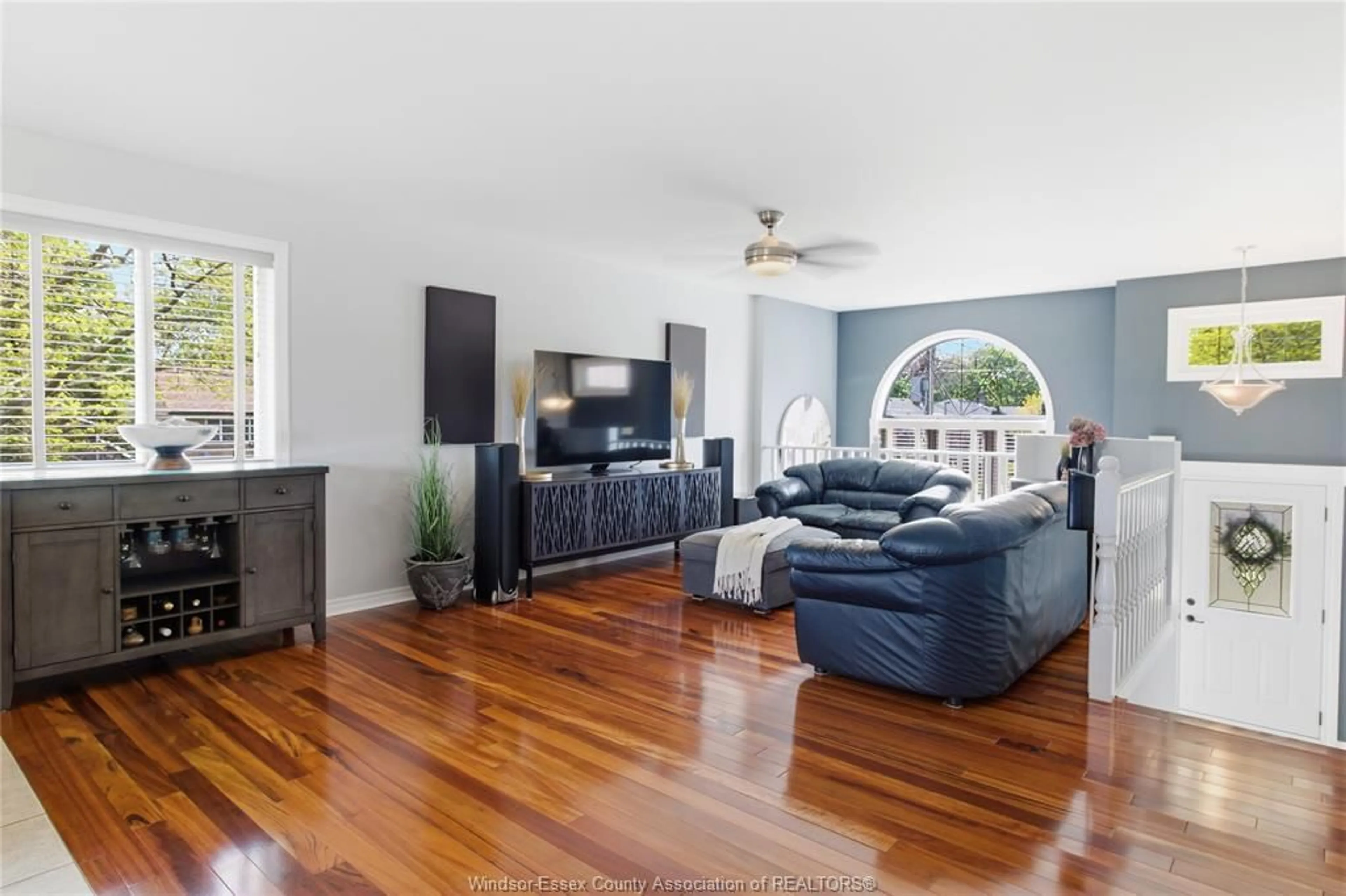 Living room with furniture, wood/laminate floor for 8578 MENARD, Windsor Ontario N8S 4V4
