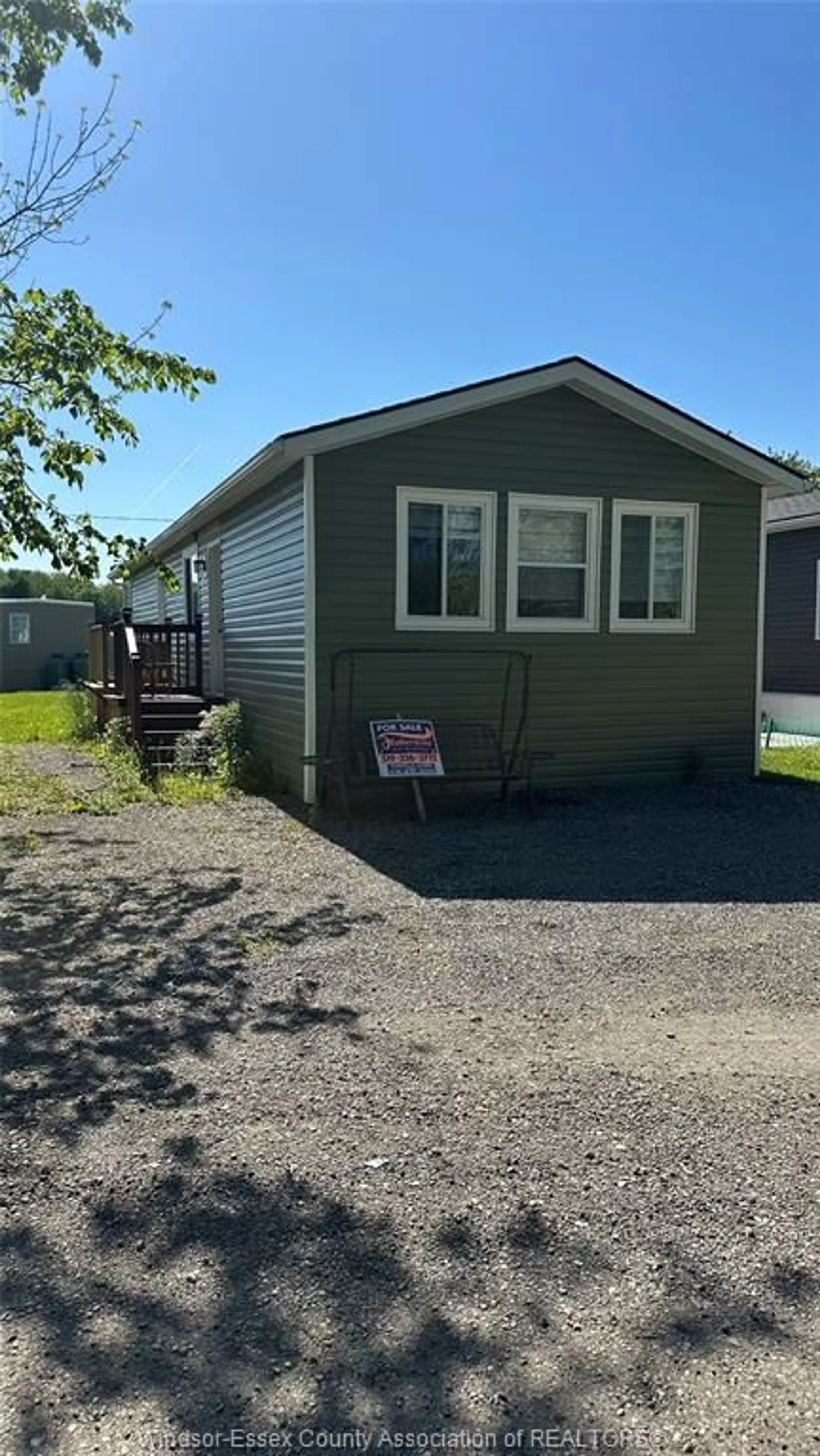 Home with vinyl exterior material, street for 11408 COUNTY ROAD 46 #9, Comber Ontario N0P 1J0