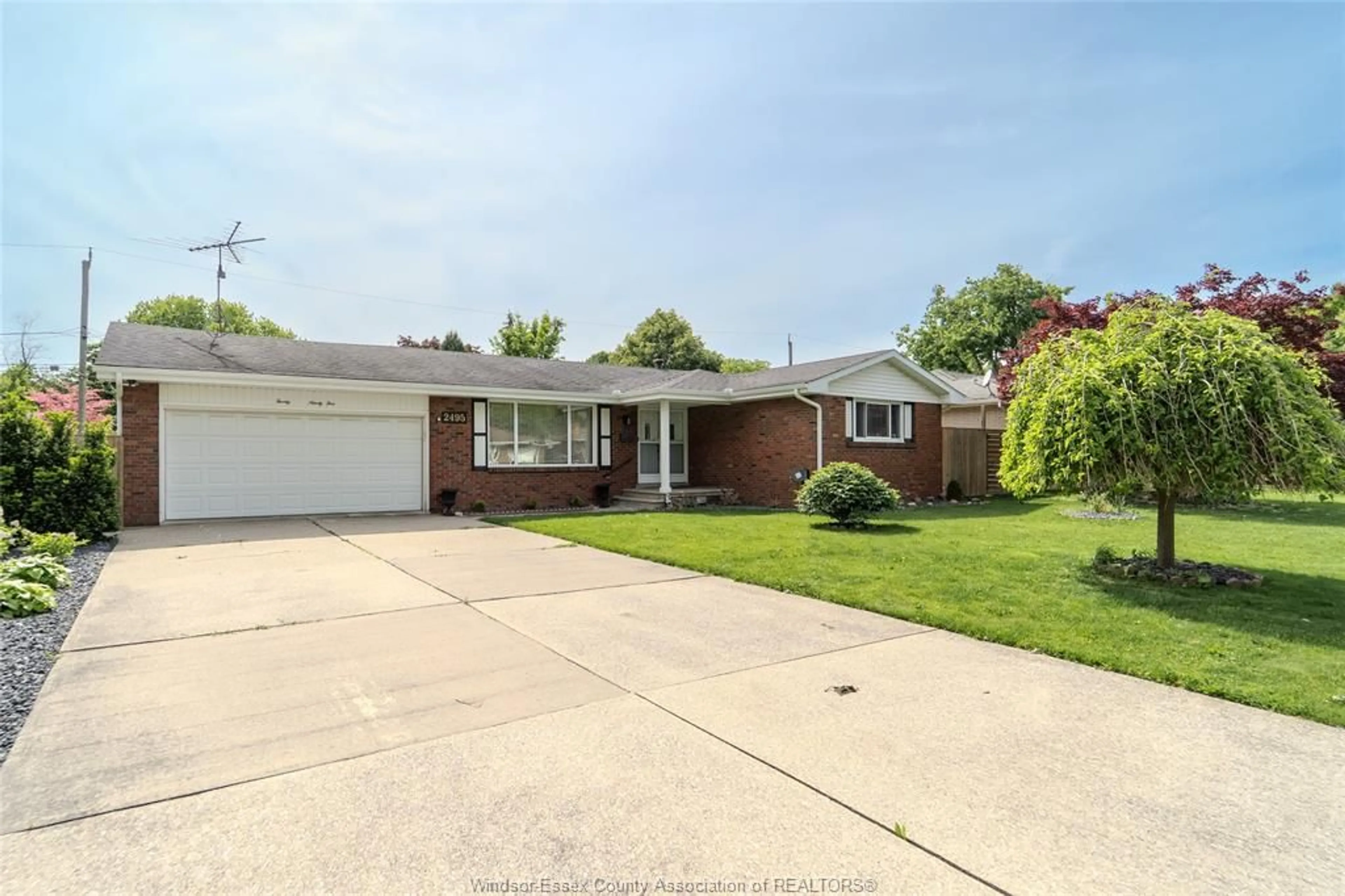 Home with brick exterior material, street for 2495 MCKAY, Windsor Ontario N9E 2P4