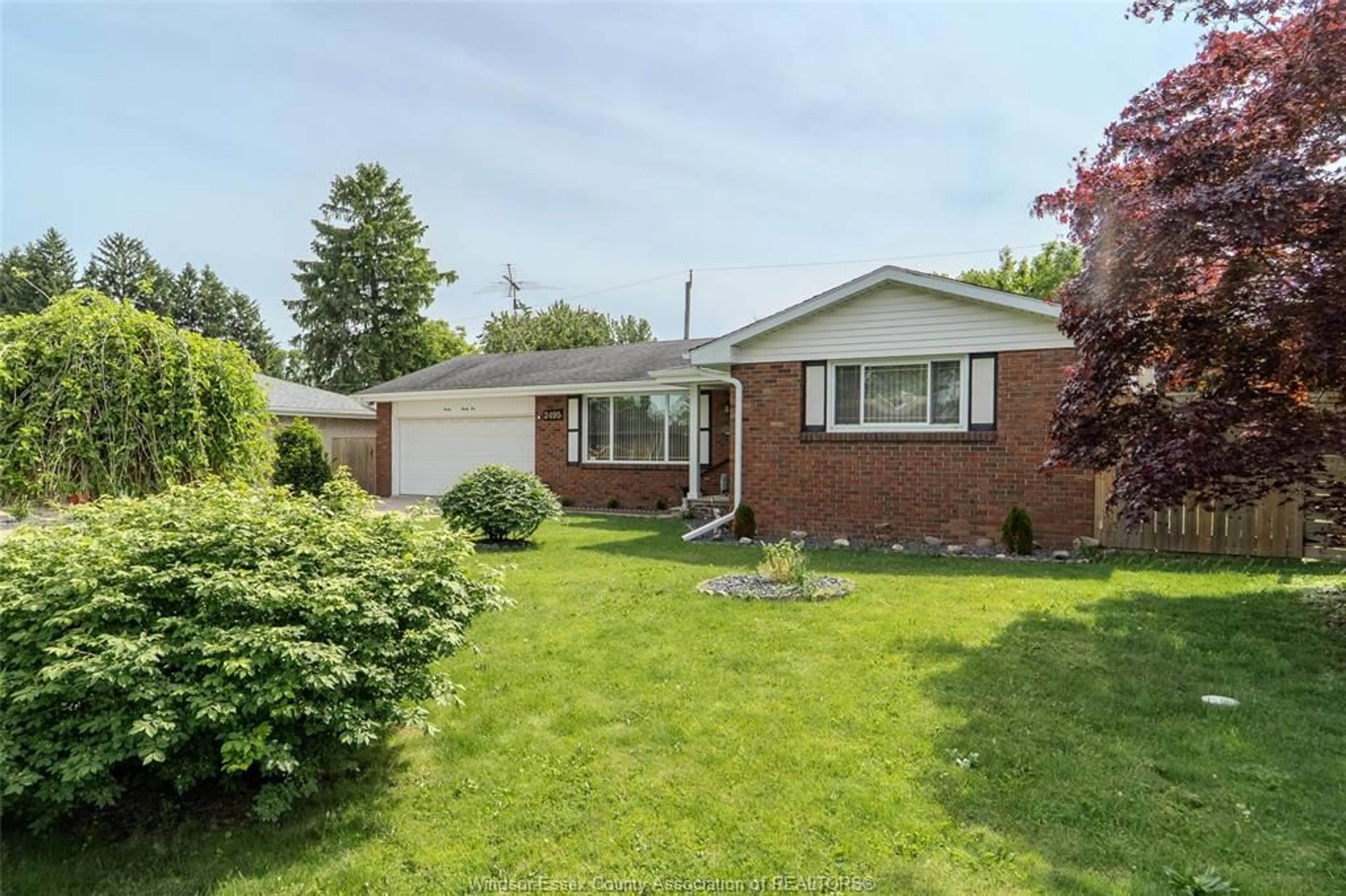 Home with brick exterior material, street for 2495 MCKAY, Windsor Ontario N9E 2P4