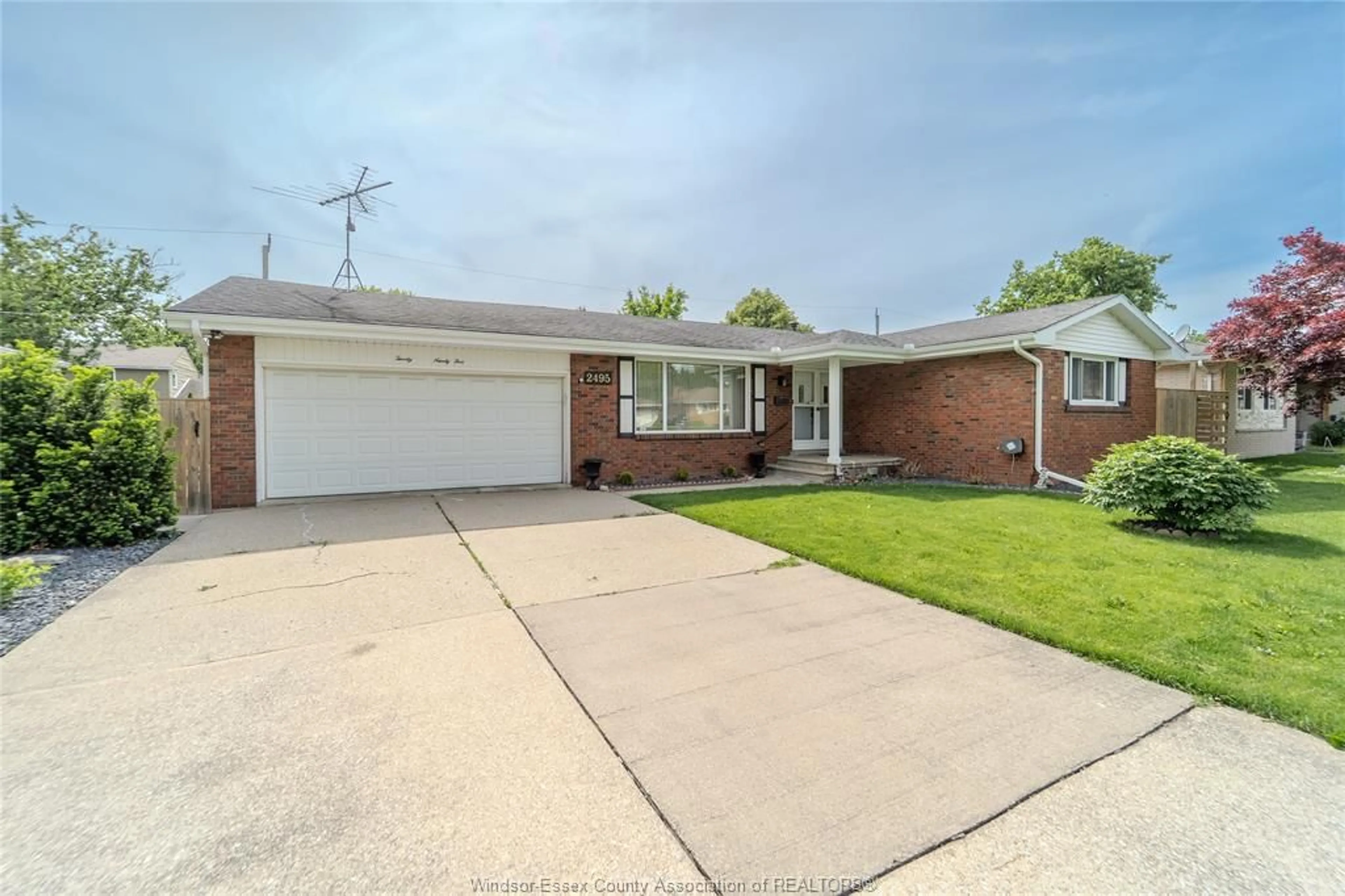 Home with brick exterior material, street for 2495 MCKAY, Windsor Ontario N9E 2P4