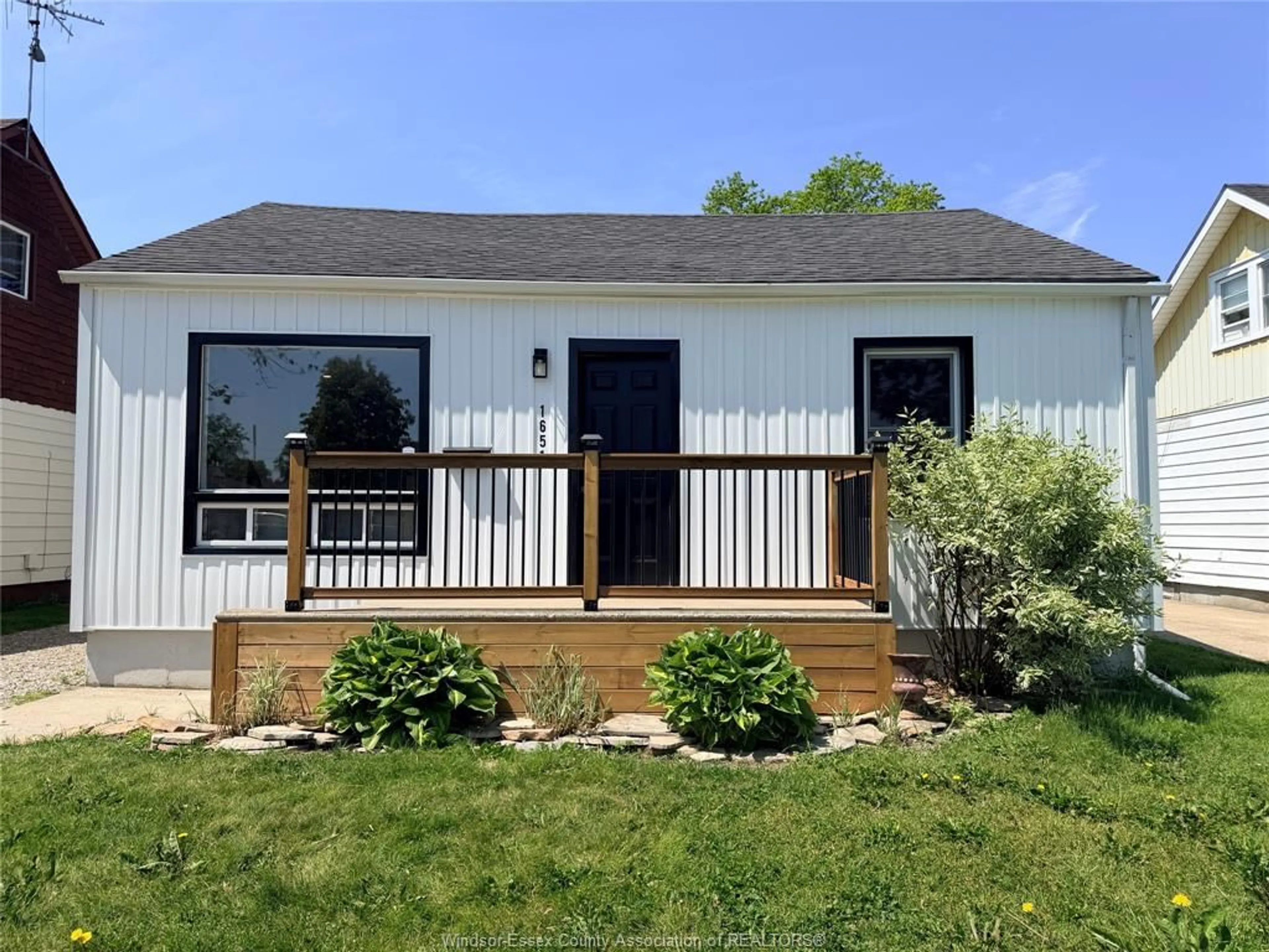 Home with vinyl exterior material, street for 1651 AUBIN, Windsor Ontario N8Y 4G3