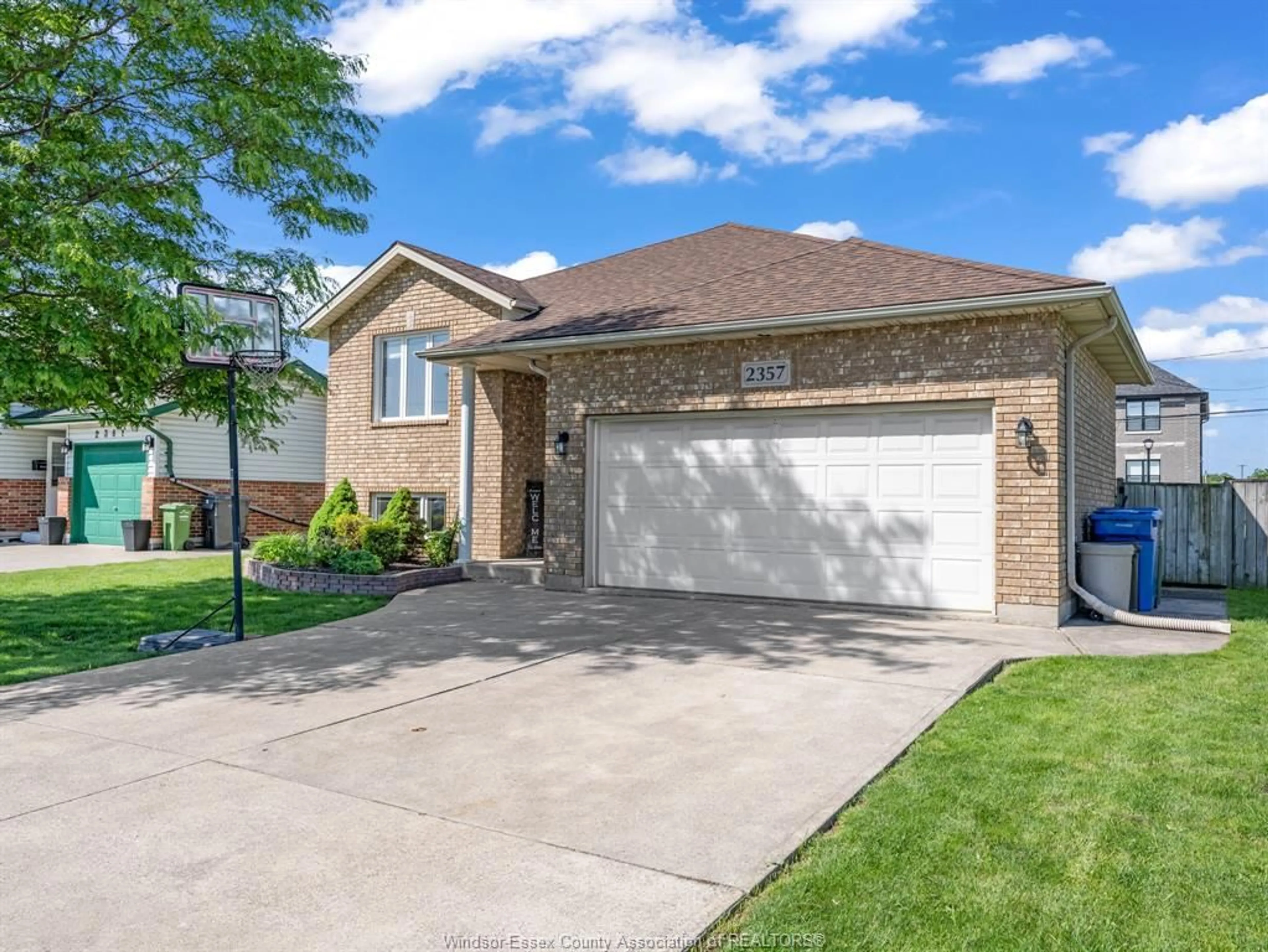 Home with brick exterior material, street for 2357 LONGFELLOW, Windsor Ontario N9B 3J7