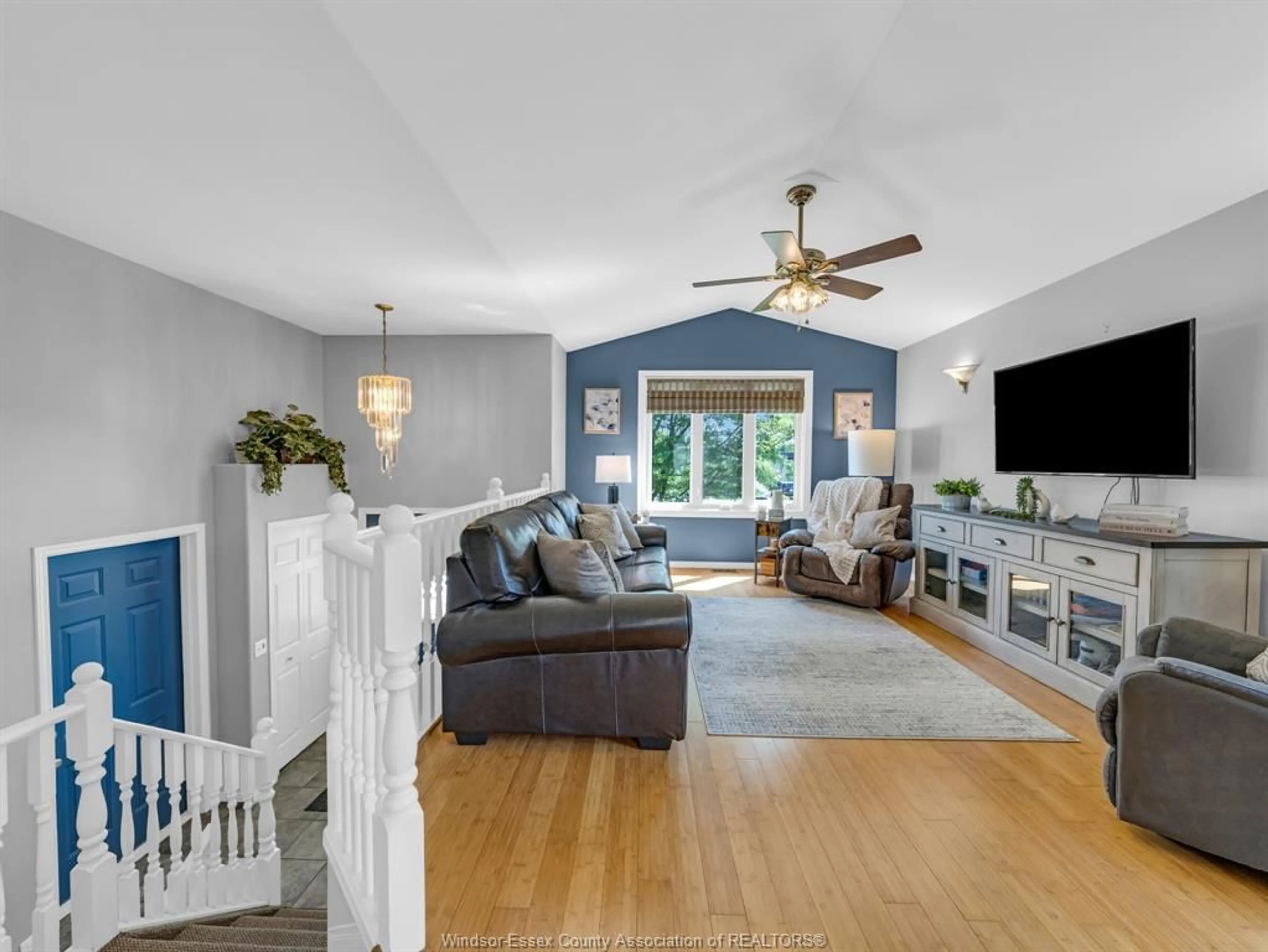 Living room with furniture, wood/laminate floor for 2357 LONGFELLOW, Windsor Ontario N9B 3J7