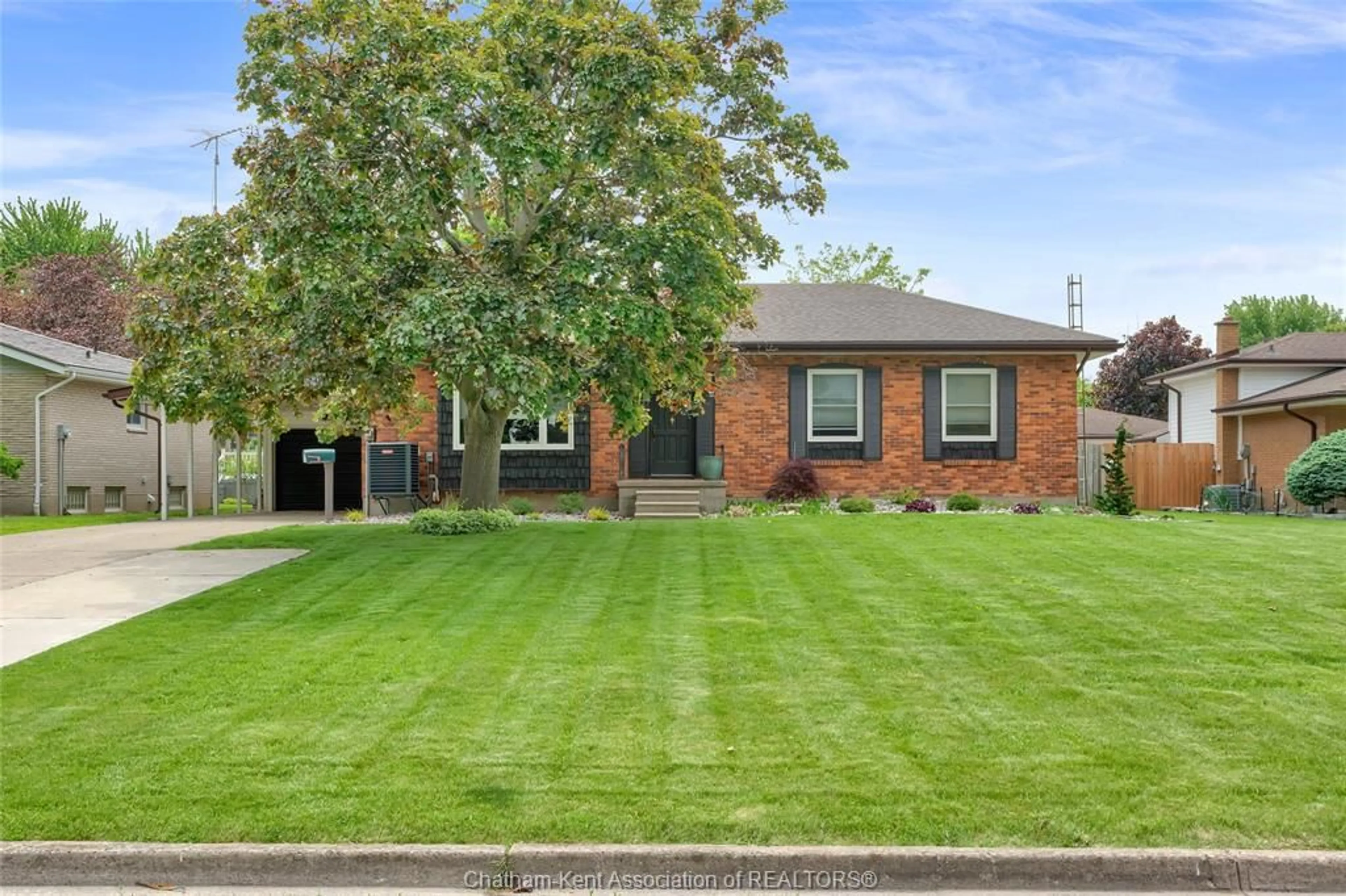 Home with brick exterior material, street for 5 Balmoral Pl, Wallaceburg Ontario N8A 2E2