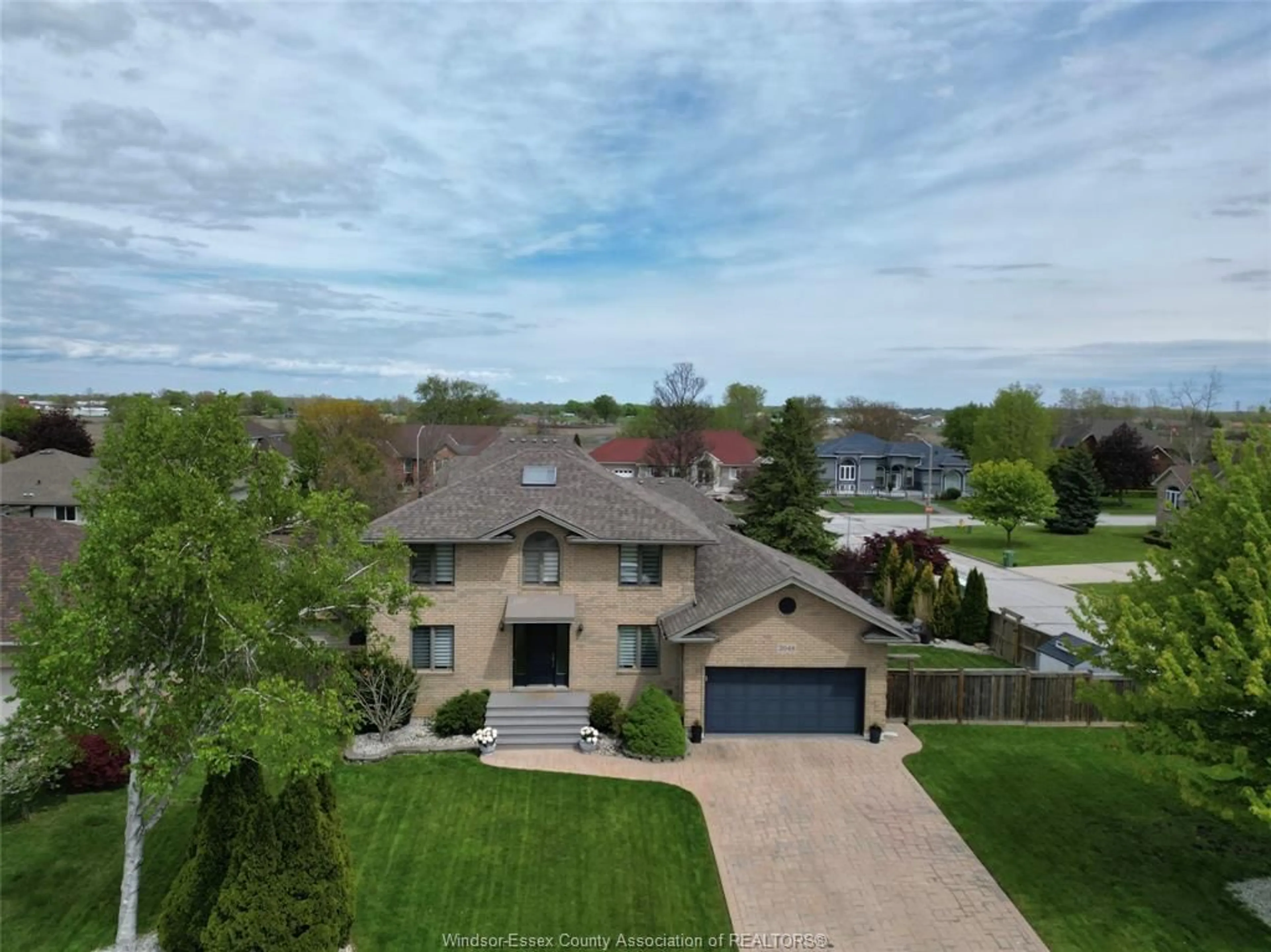 A pic from outside/outdoor area/front of a property/back of a property/a pic from drone, unknown for 2048 Eugeni, Tecumseh Ontario N9K 1B3