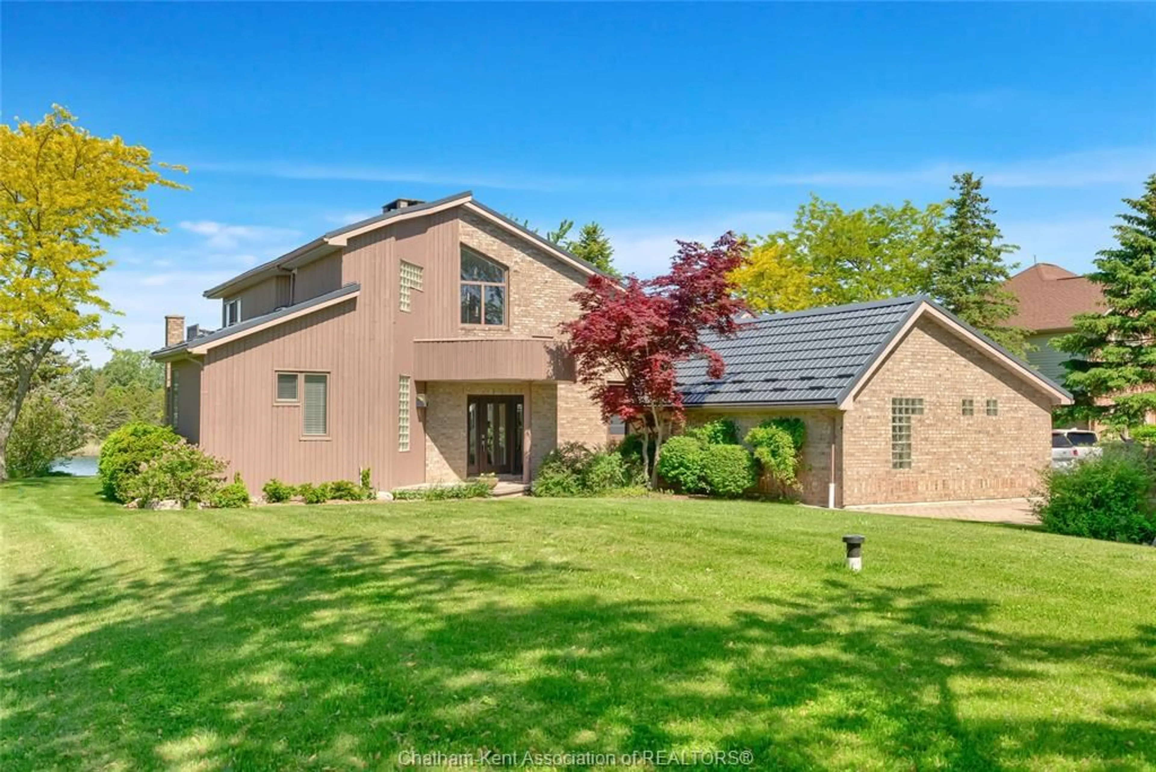 Home with brick exterior material, street for 10691 Lakeview Dr, Chatham Ontario N7M 5J3