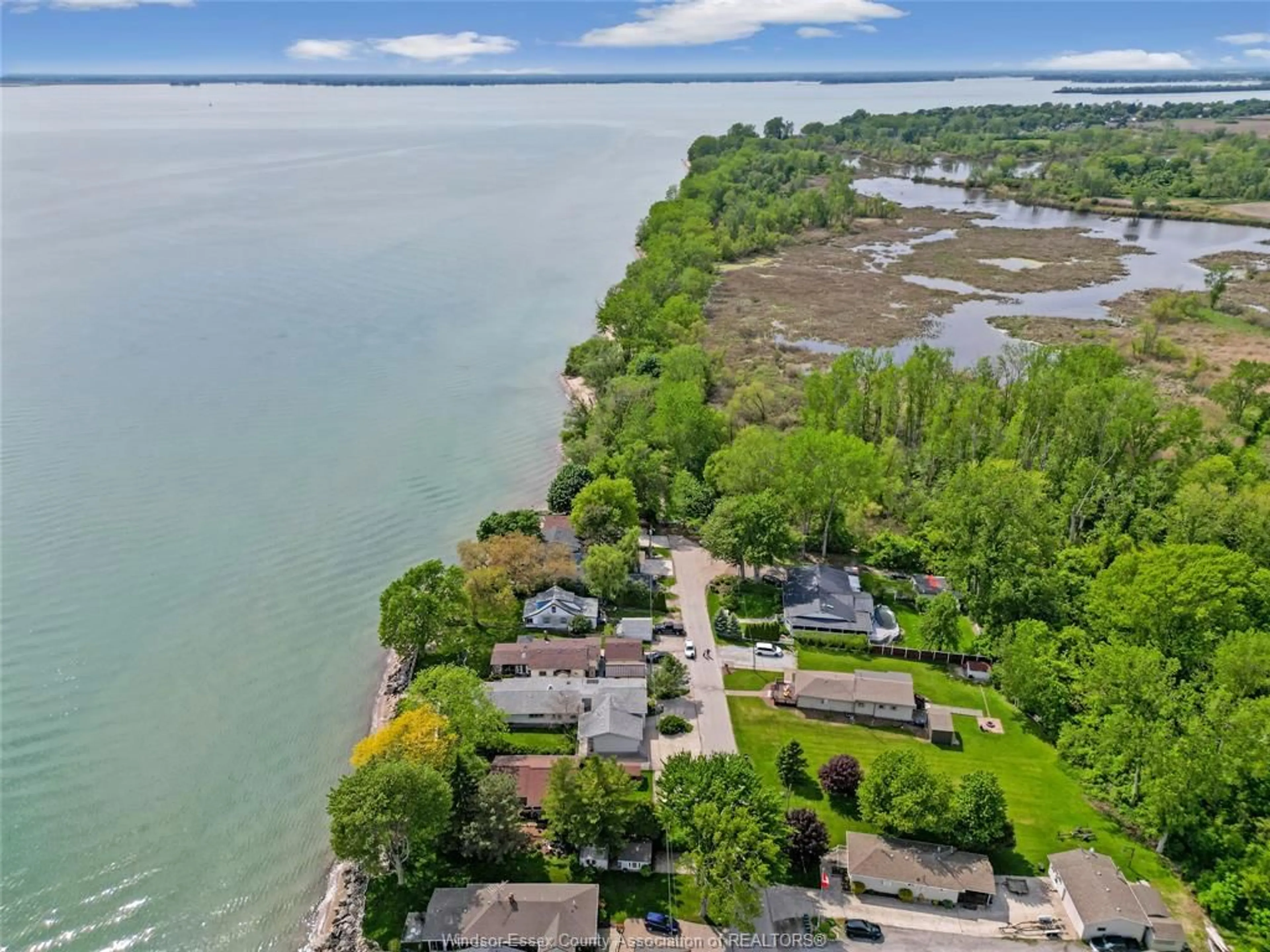 A pic from outside/outdoor area/front of a property/back of a property/a pic from drone, water/lake/river/ocean view for 91 WILLOW BEACH, Amherstburg Ontario N9V 2Y8