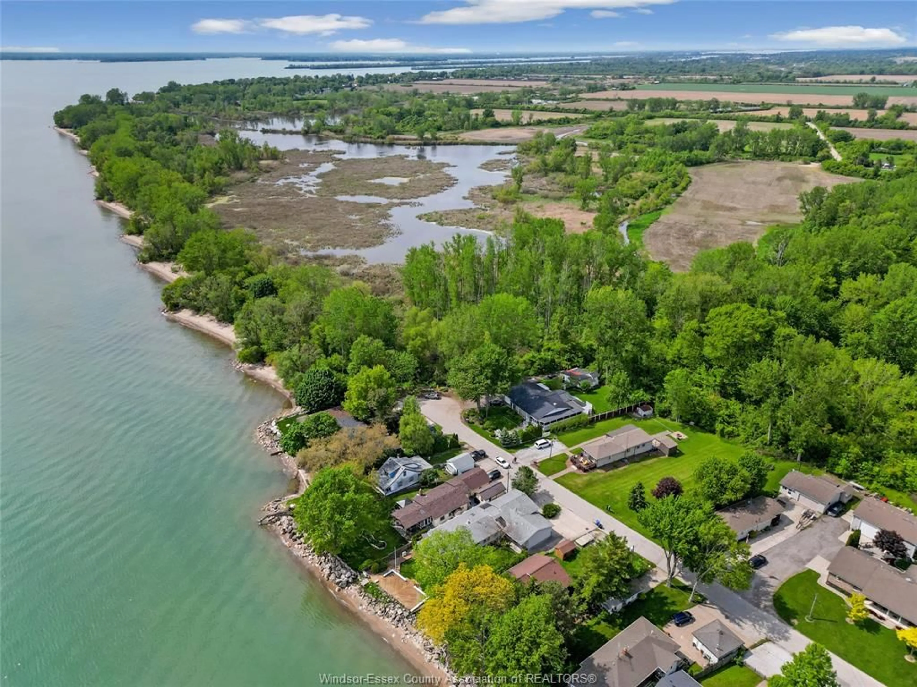 A pic from outside/outdoor area/front of a property/back of a property/a pic from drone, water/lake/river/ocean view for 91 WILLOW BEACH, Amherstburg Ontario N9V 2Y8
