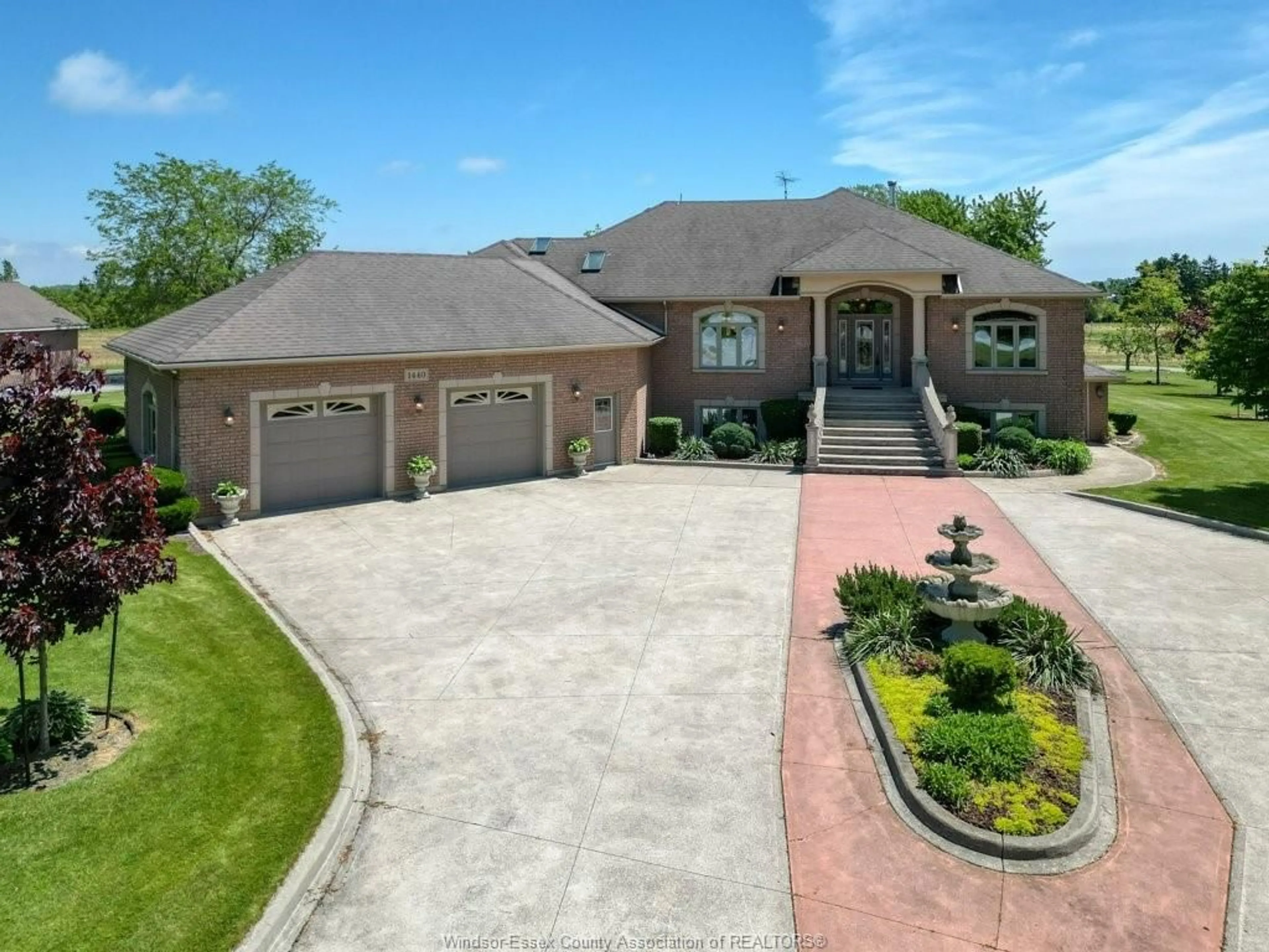 Home with brick exterior material, street for 1440 Ridge Rd, Harrow Ontario N0R 1G0