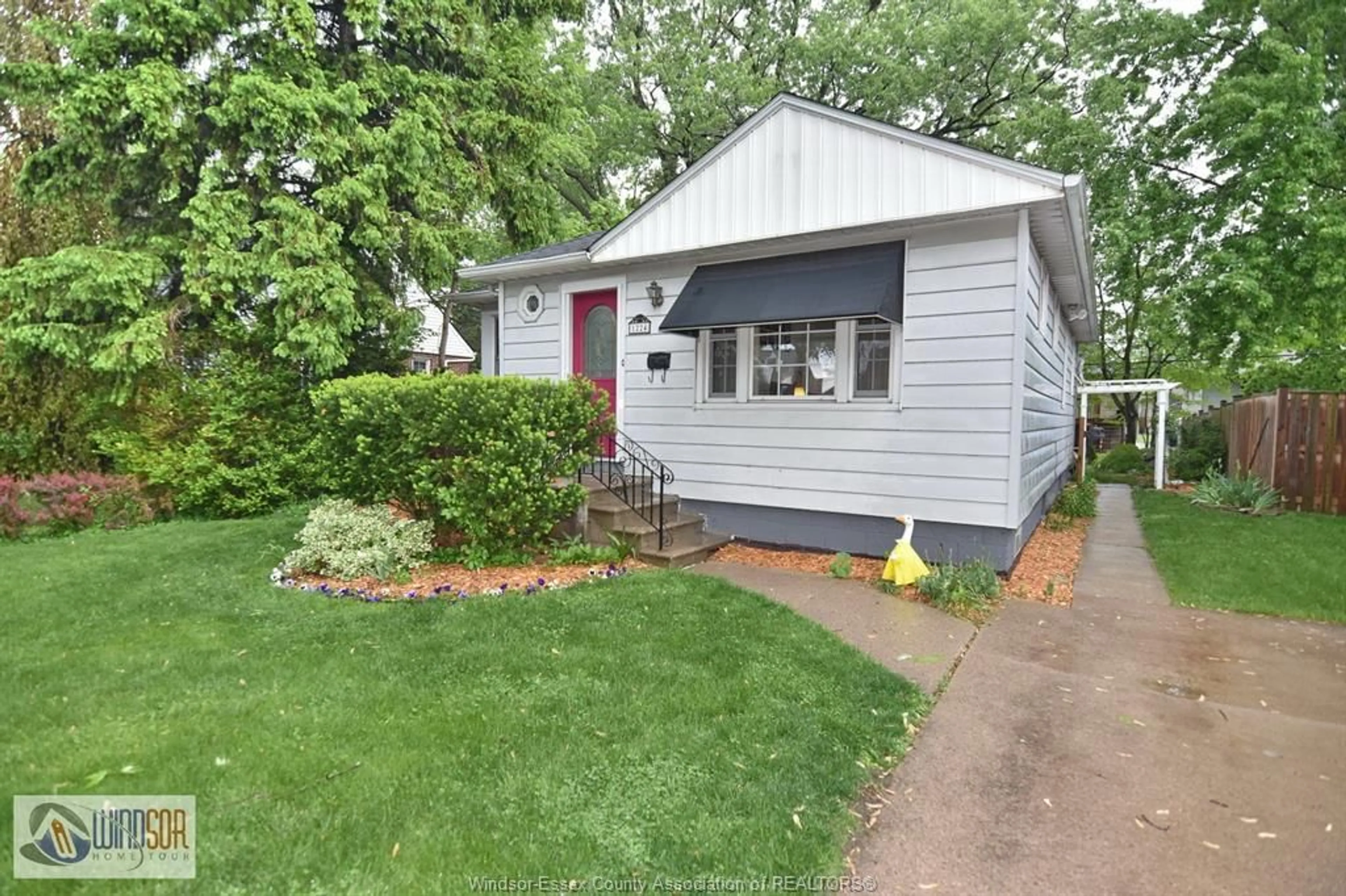 Home with vinyl exterior material, street for 1224 BELLE ISLE VIEW, Windsor Ontario N8S 3G7