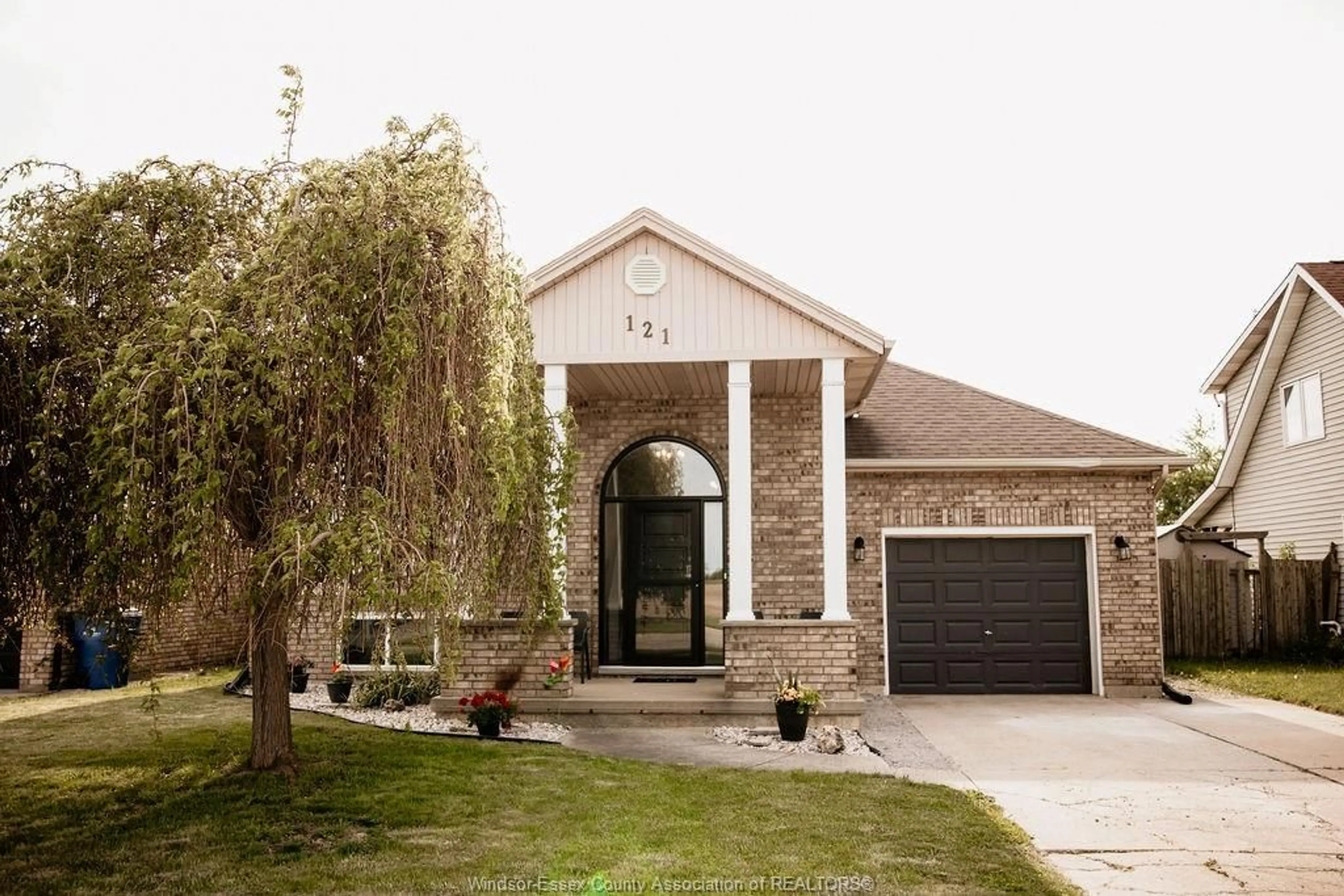 Home with brick exterior material, street for 121 Queen St. South, Tilbury Ontario N0P 2L0