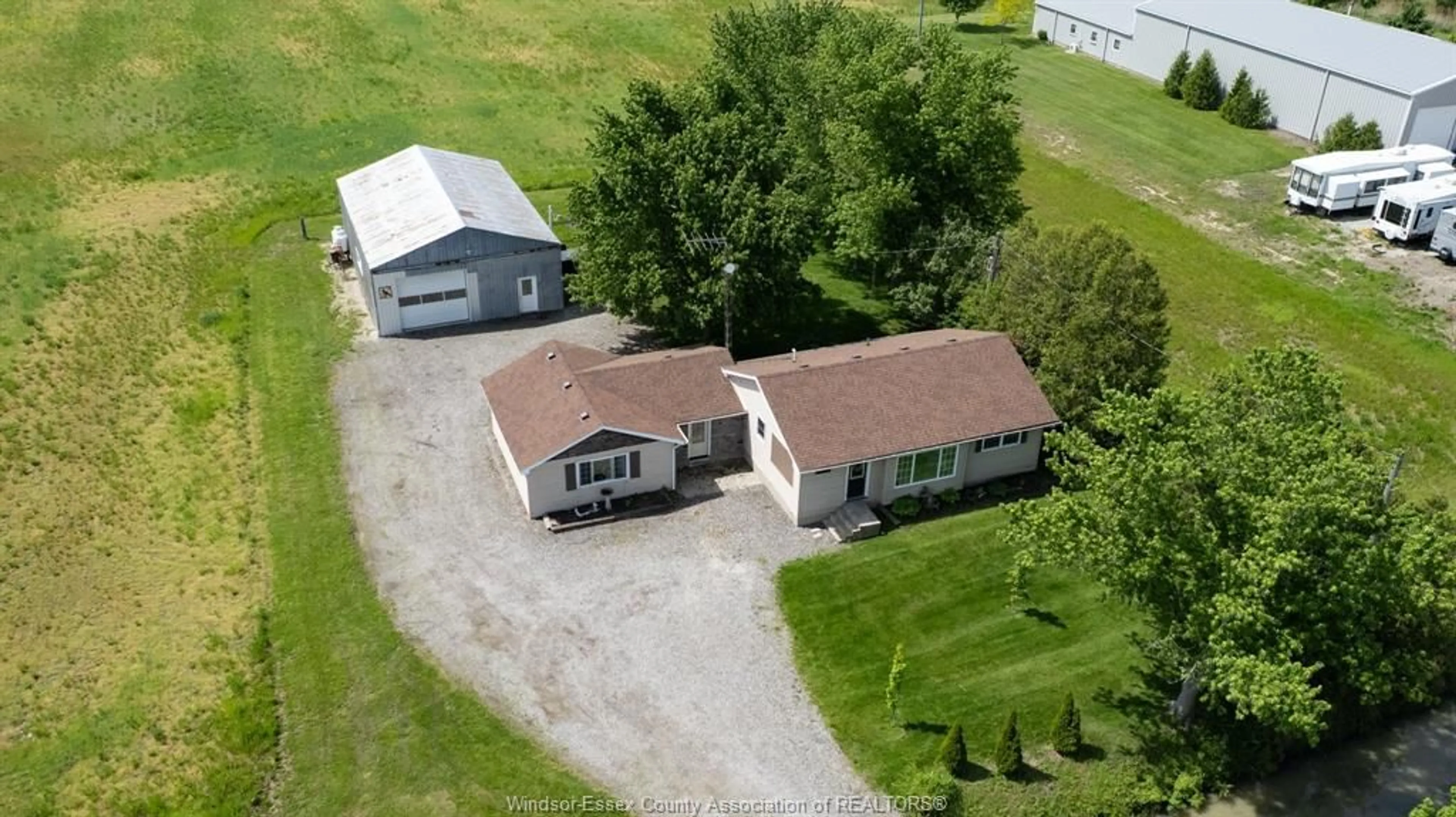 A pic from outside/outdoor area/front of a property/back of a property/a pic from drone, building for 17825 LAKESHORE RD 303, Tilbury North Ontario N0P 2L0